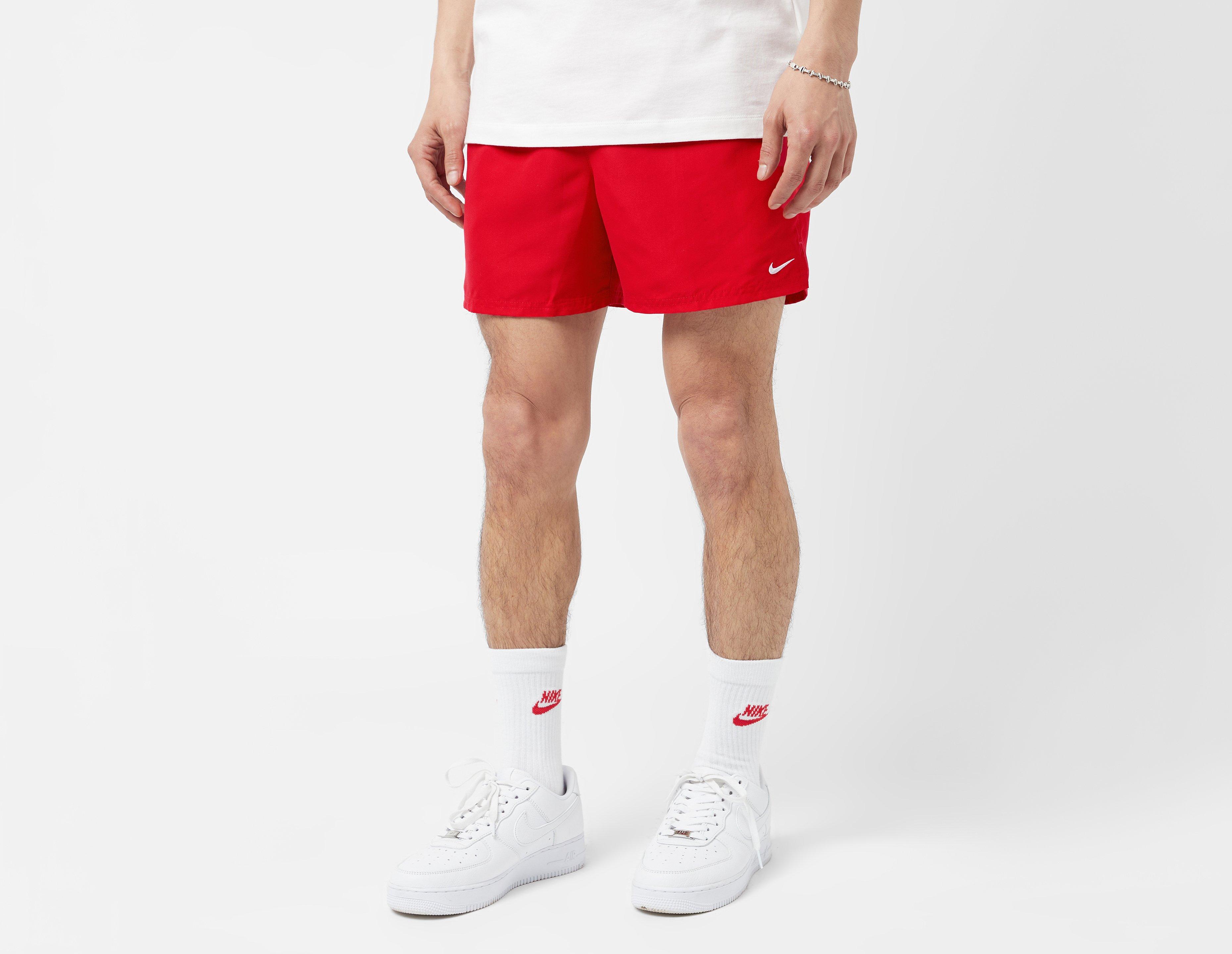 men red nike shorts