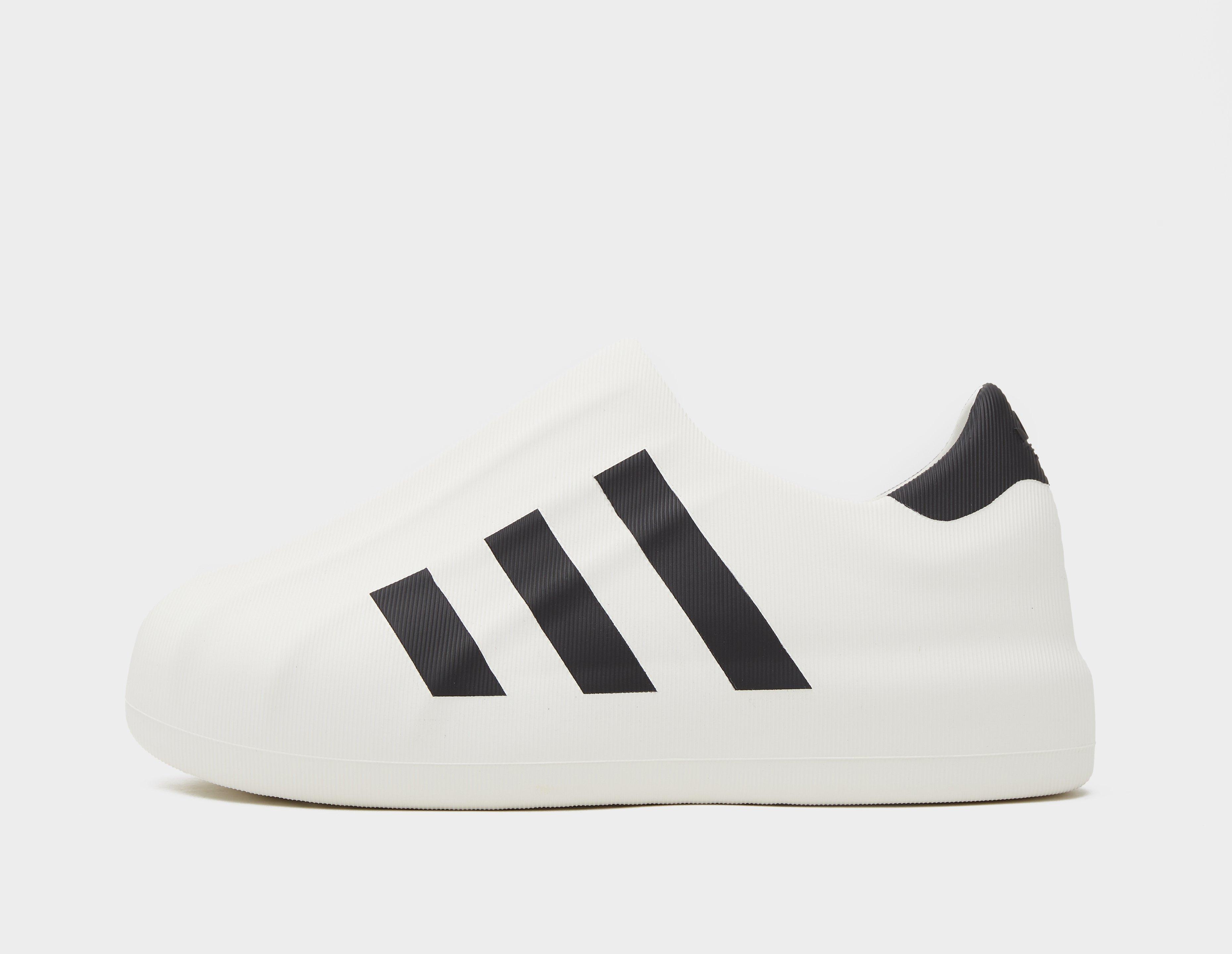 Adidas superstar store slip ons white