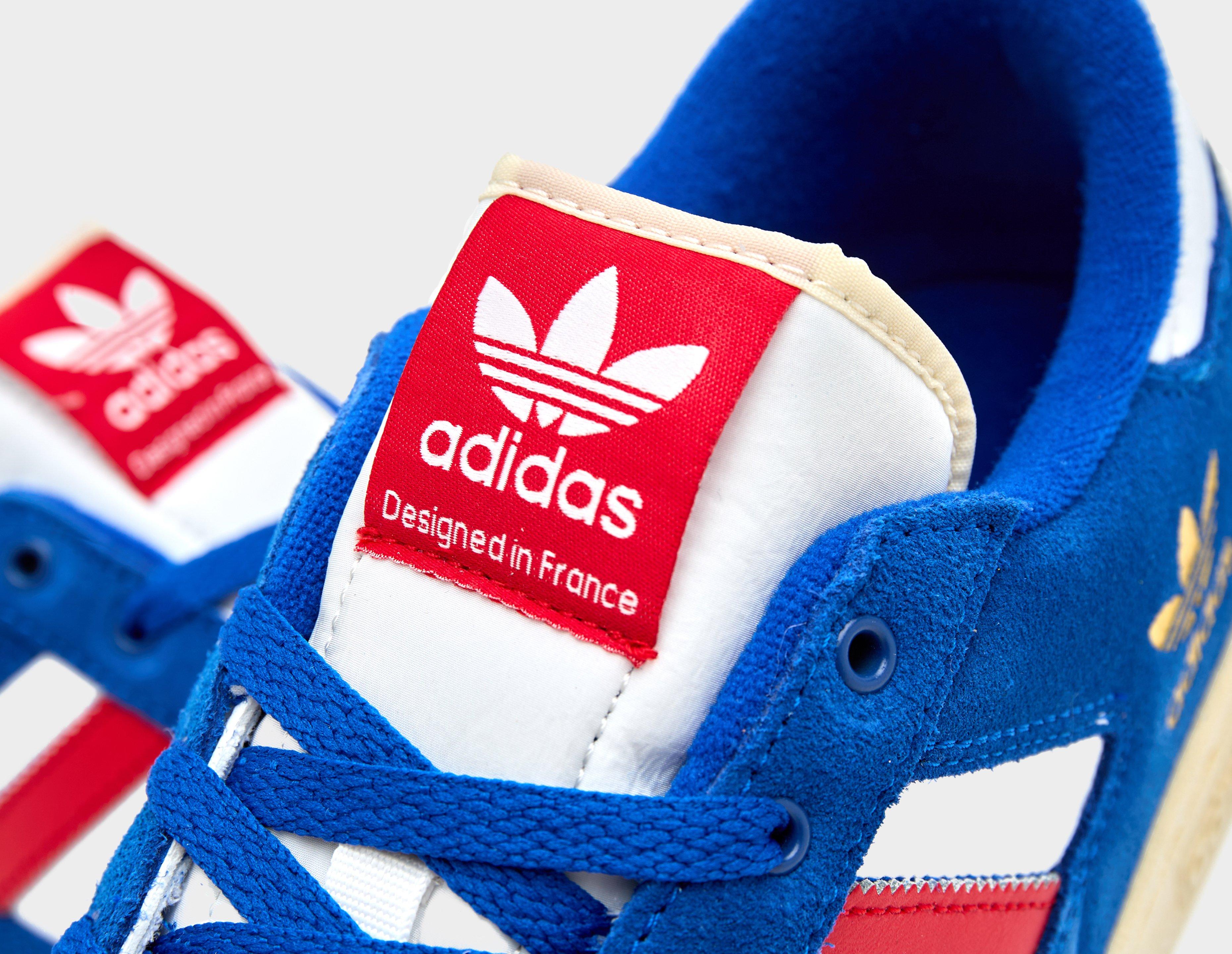 Adidas red stripe on sale trainers