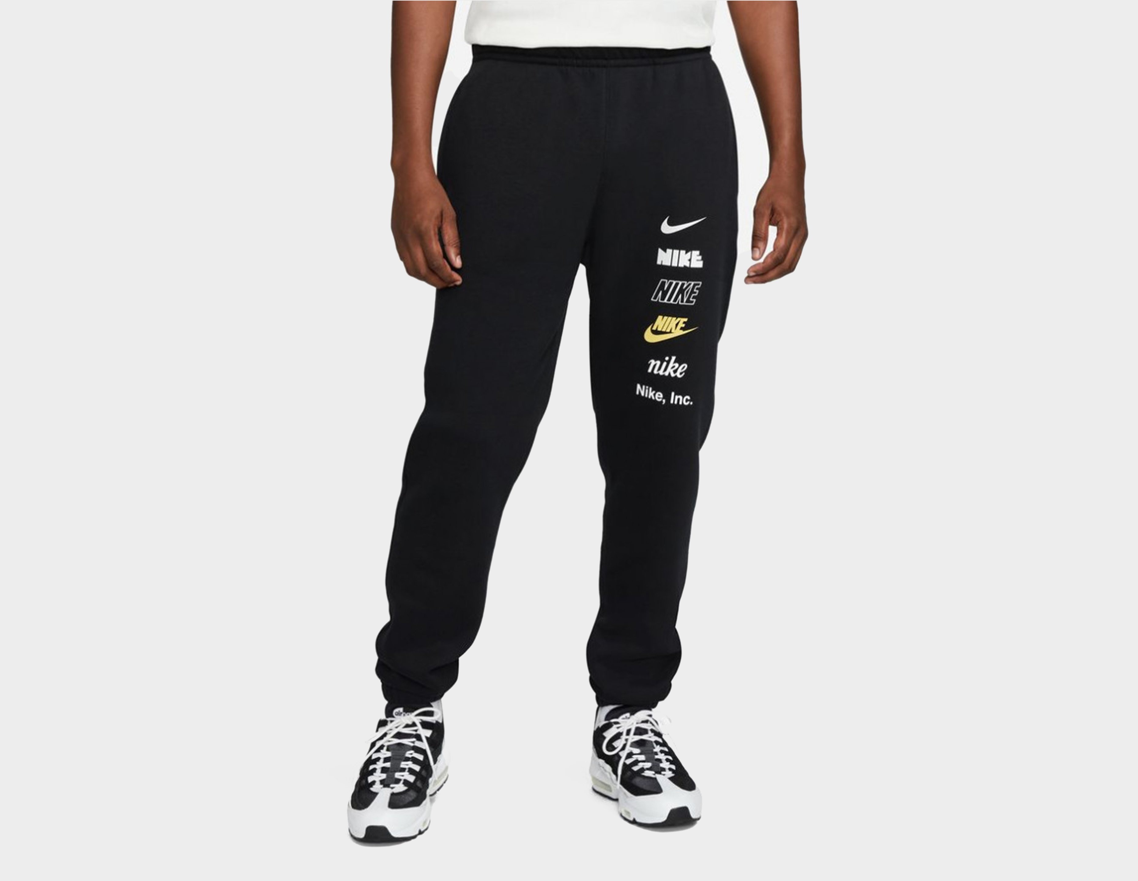 stacked black joggers