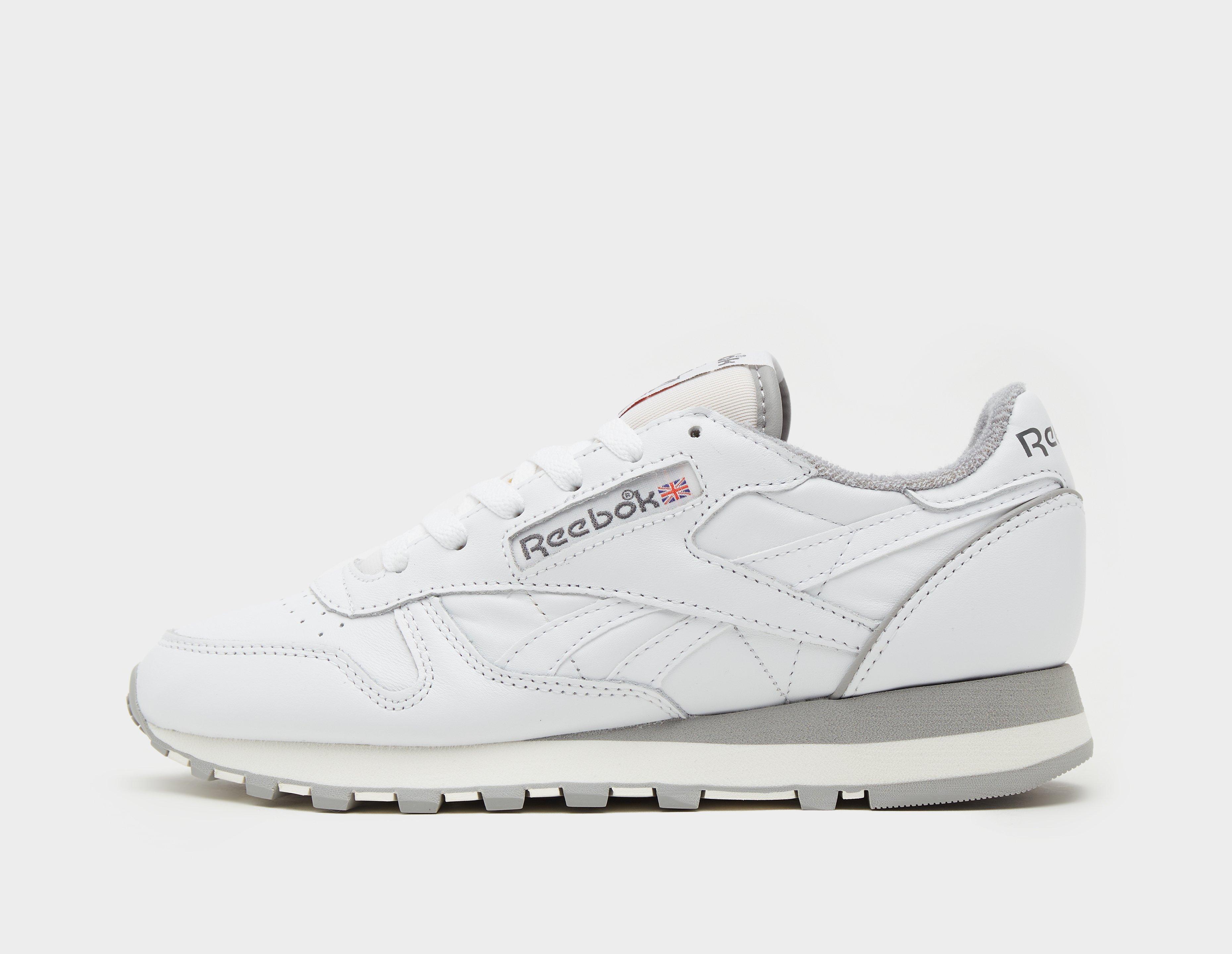 White women's reebok store classics