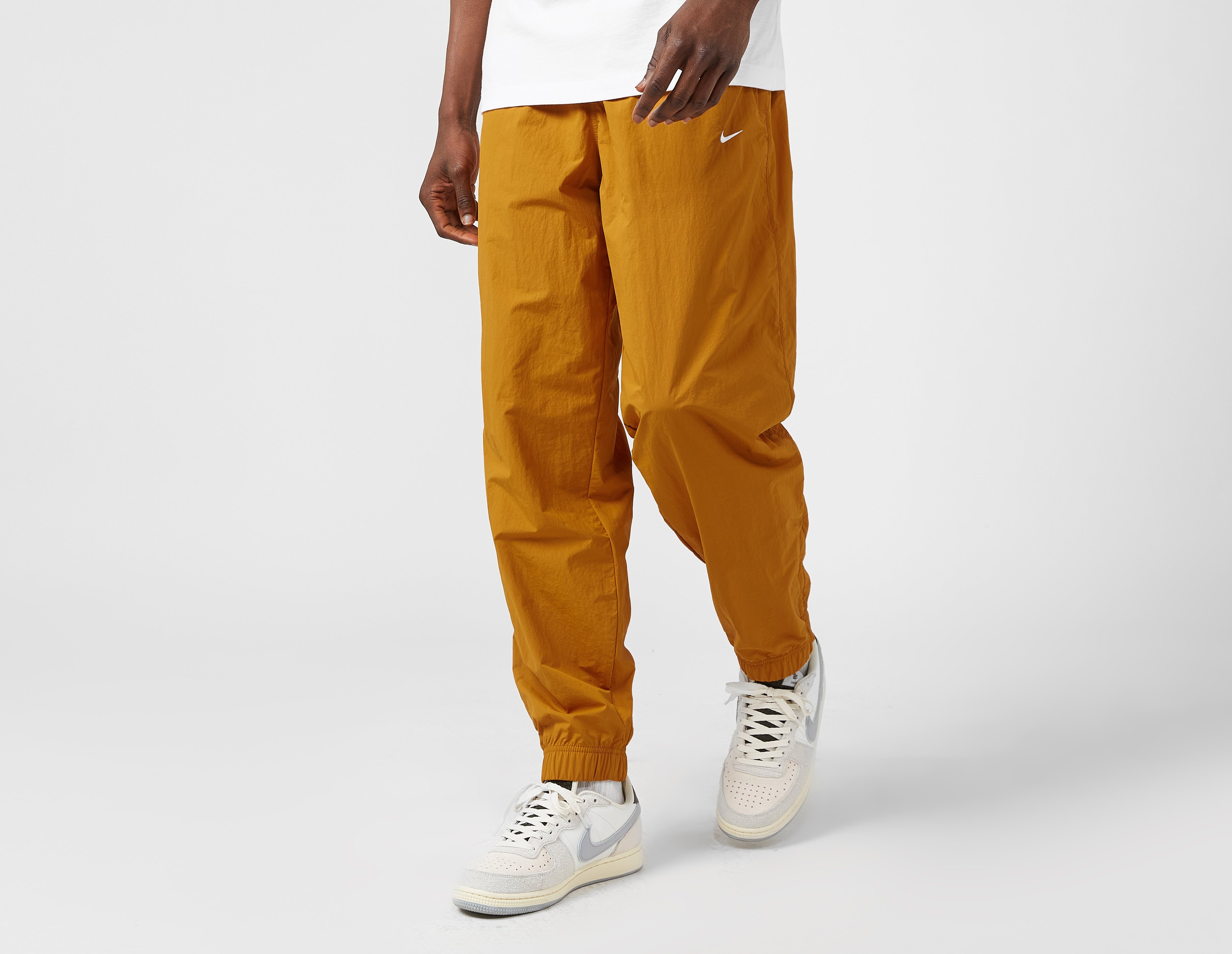 Healthdesign? | Orange Nike NRG Premium Essentials Track Pants
