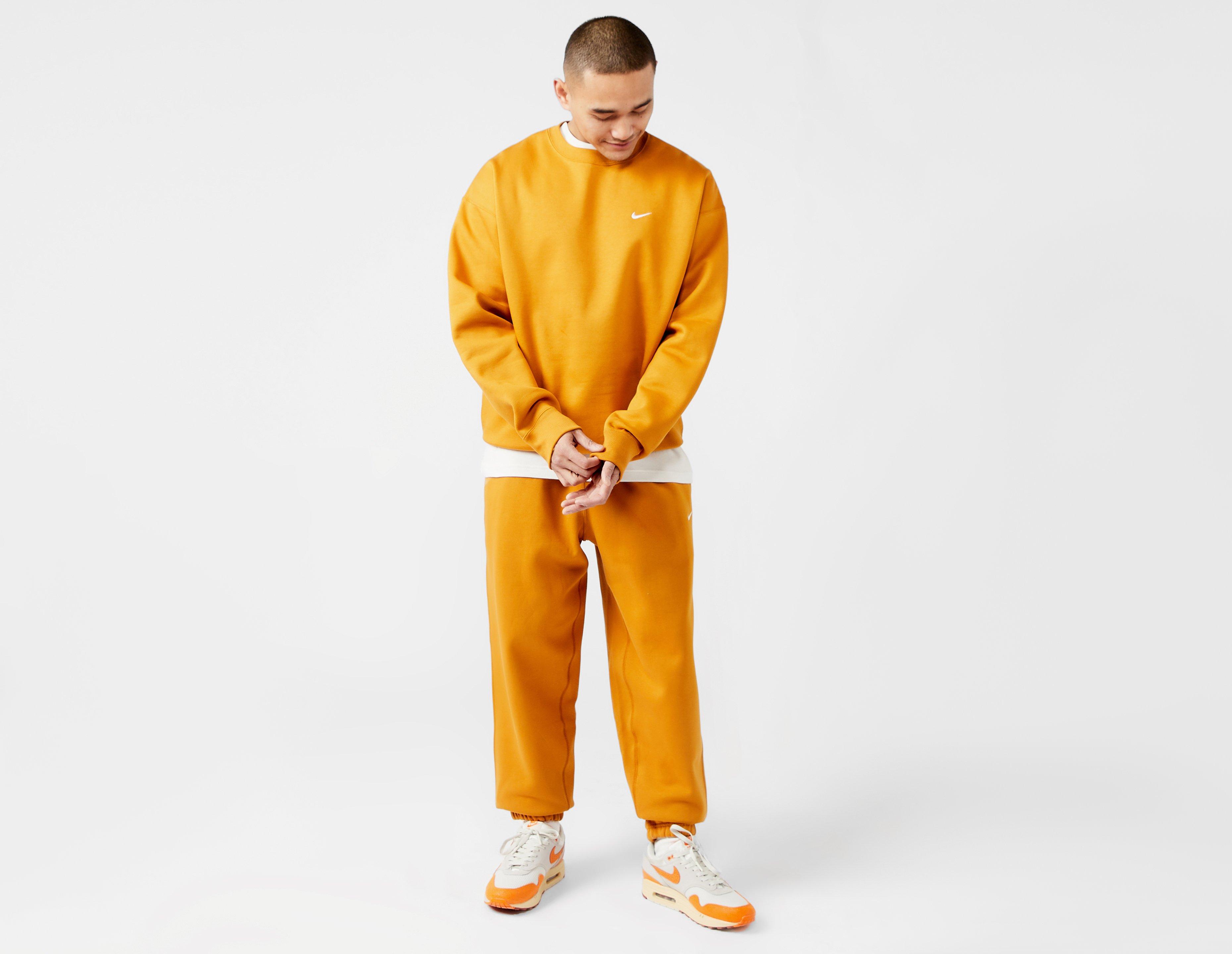 Nike Mini Swoosh Oversized Joggers In Orange-Yellow