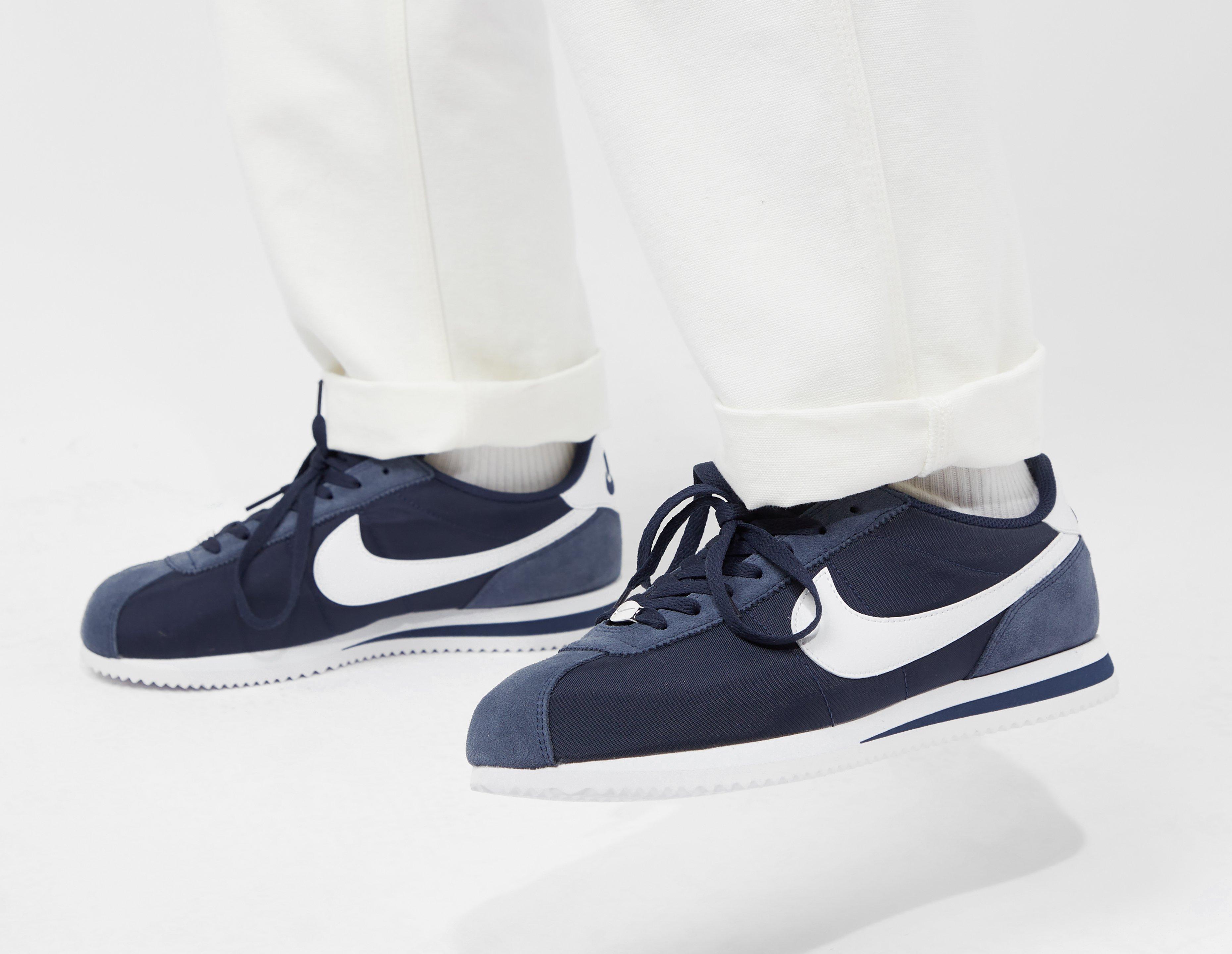 Navy and best sale white nike cortez