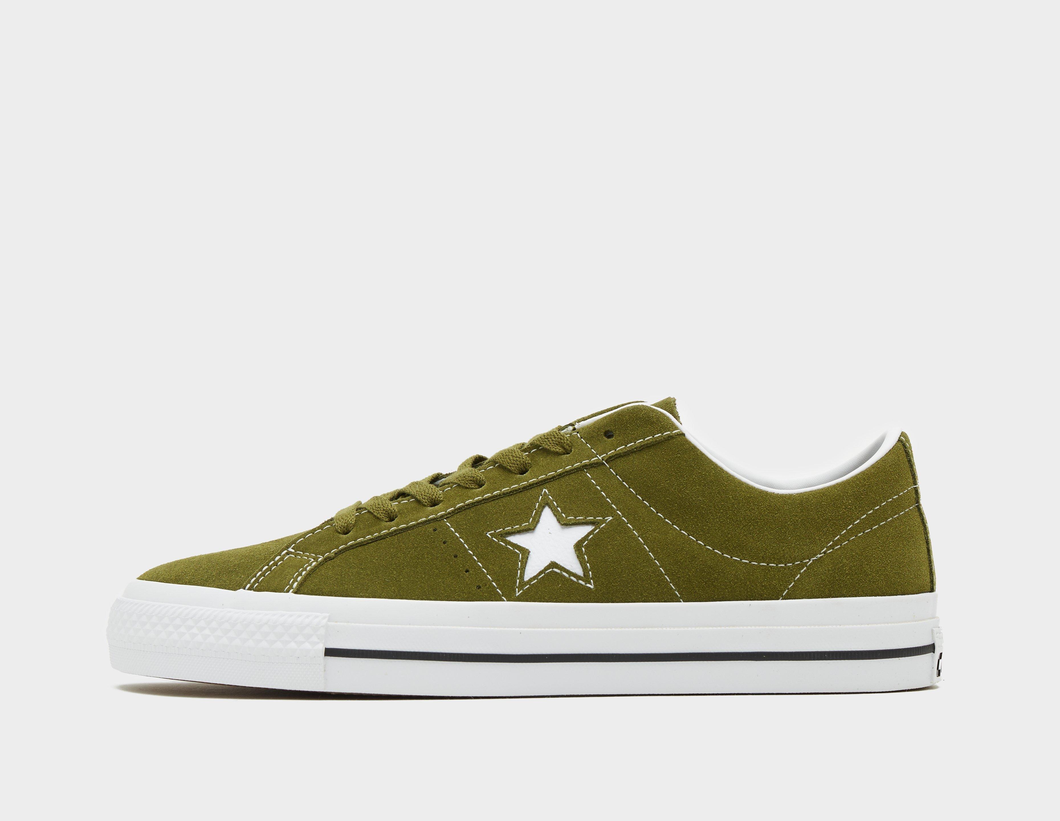 Green and 2025 gold converse