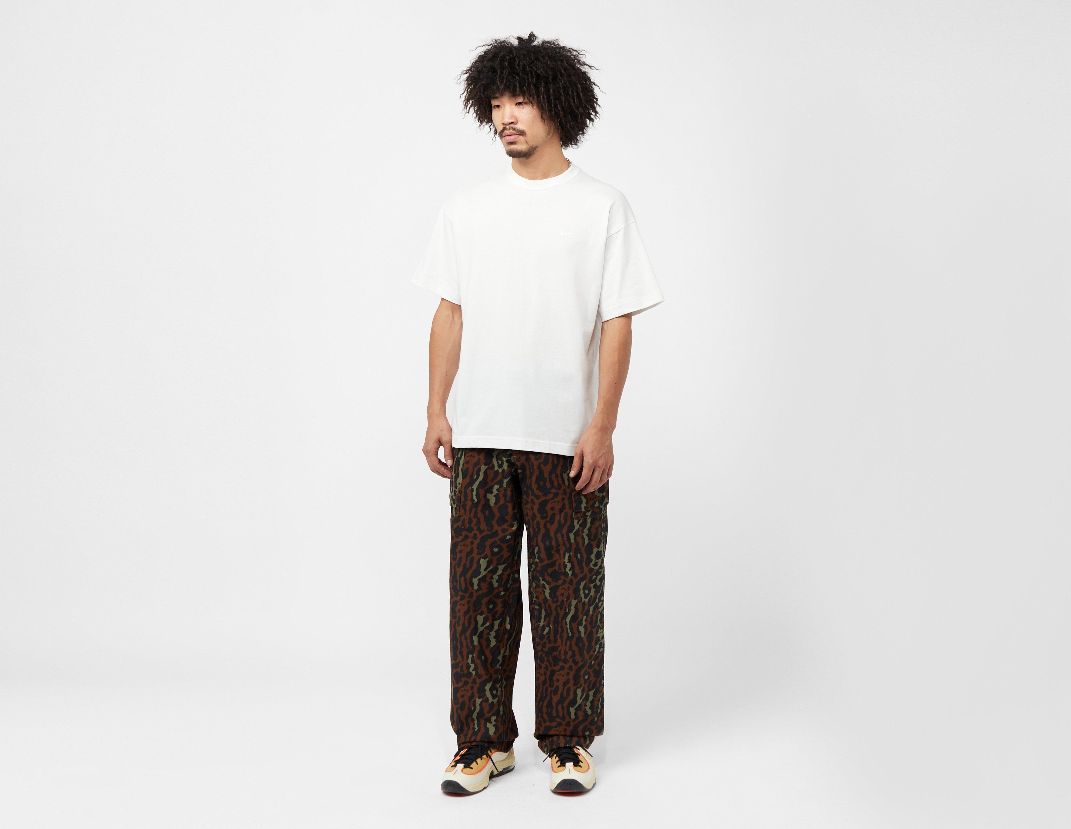 Nike Life Men's Allover Print Cargo Pants.