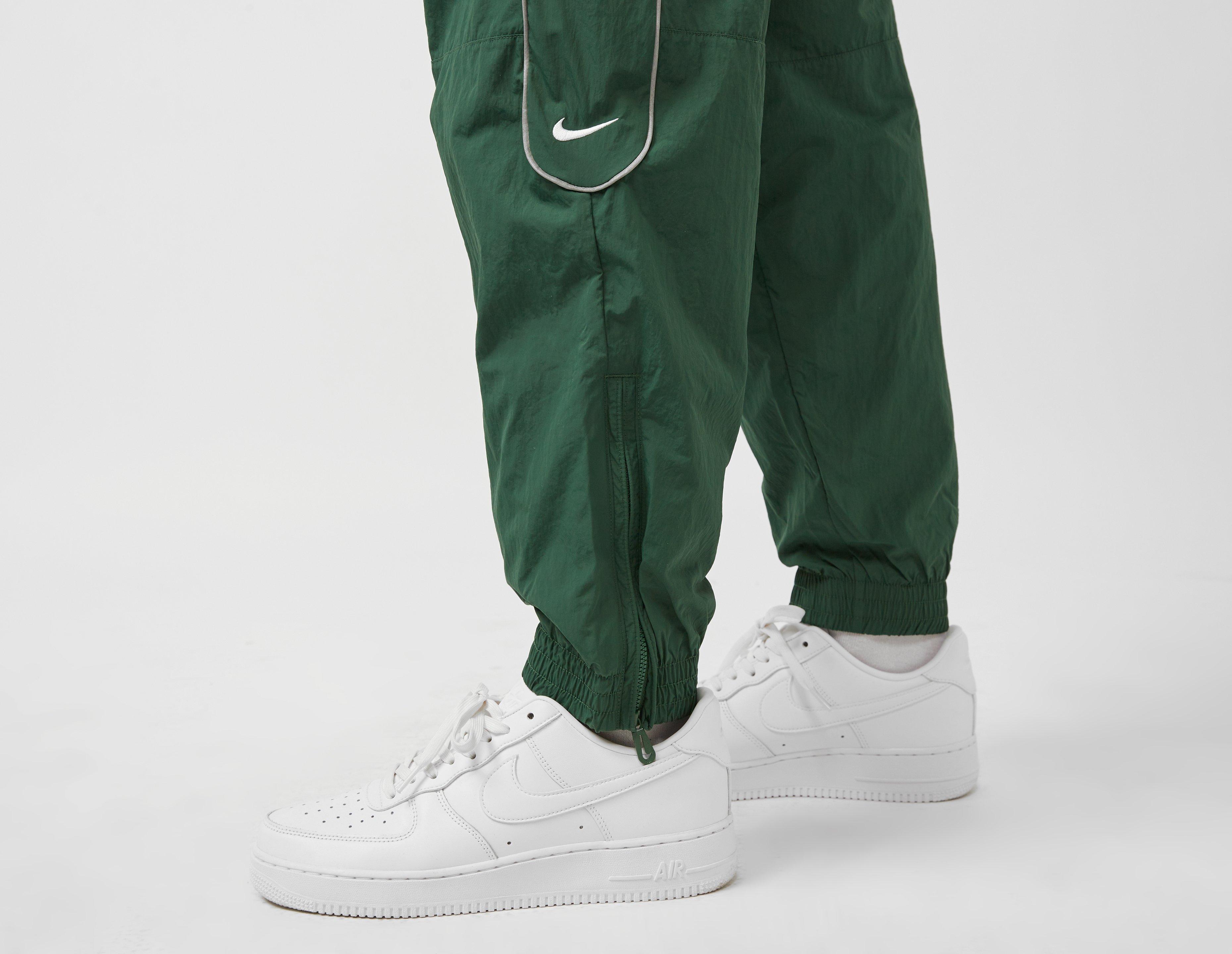 Nike track hot sale pants green