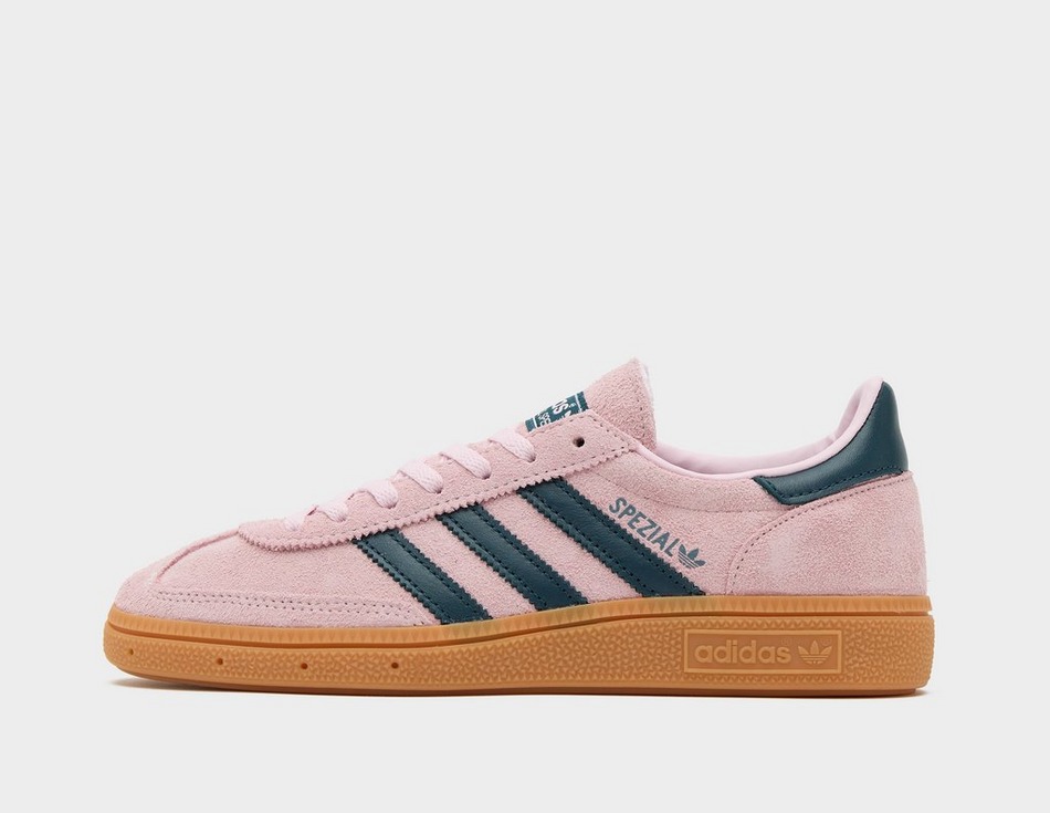 This is a sneaker in black and light pink.