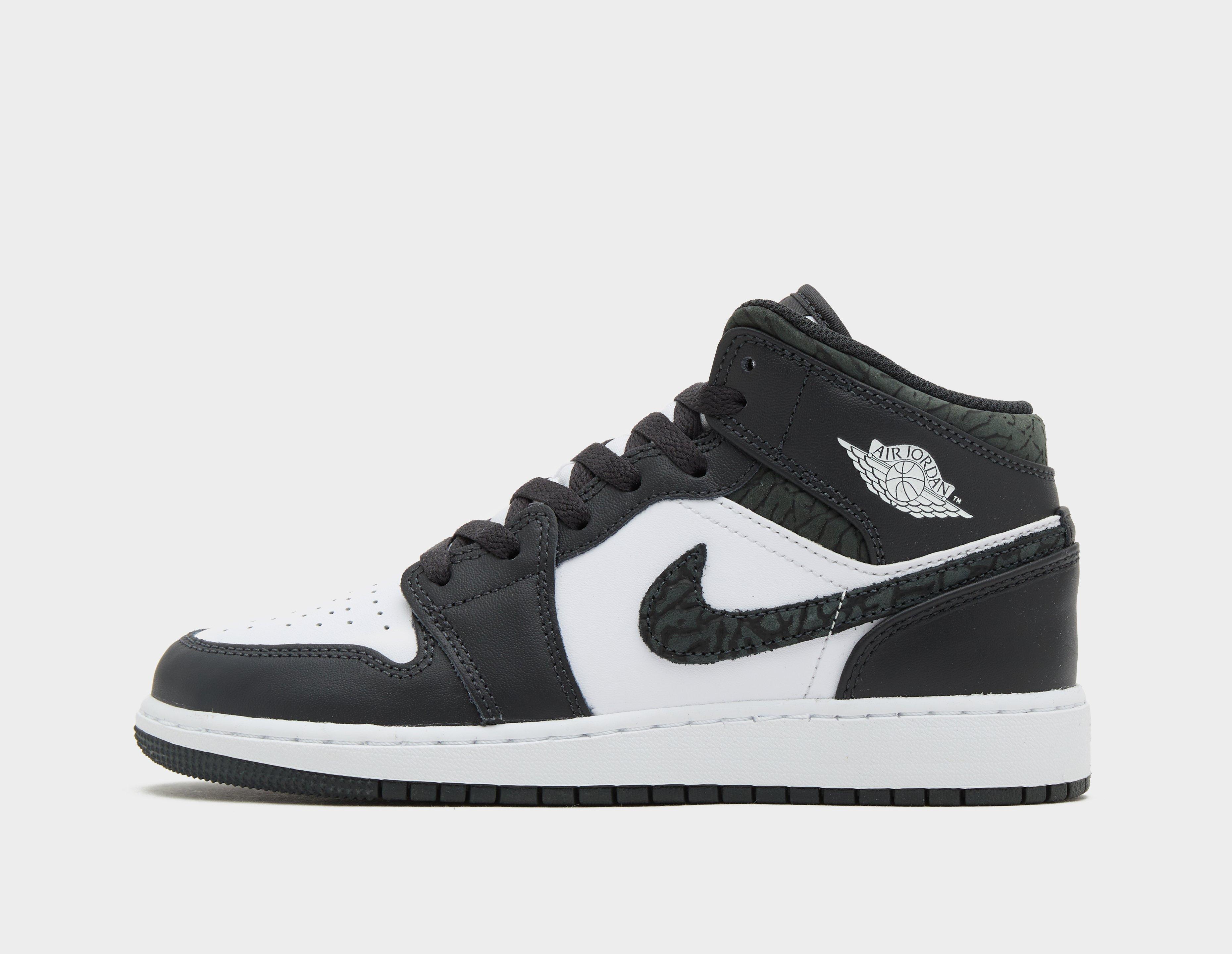 Black Jordan Air 1 Mid Junior size