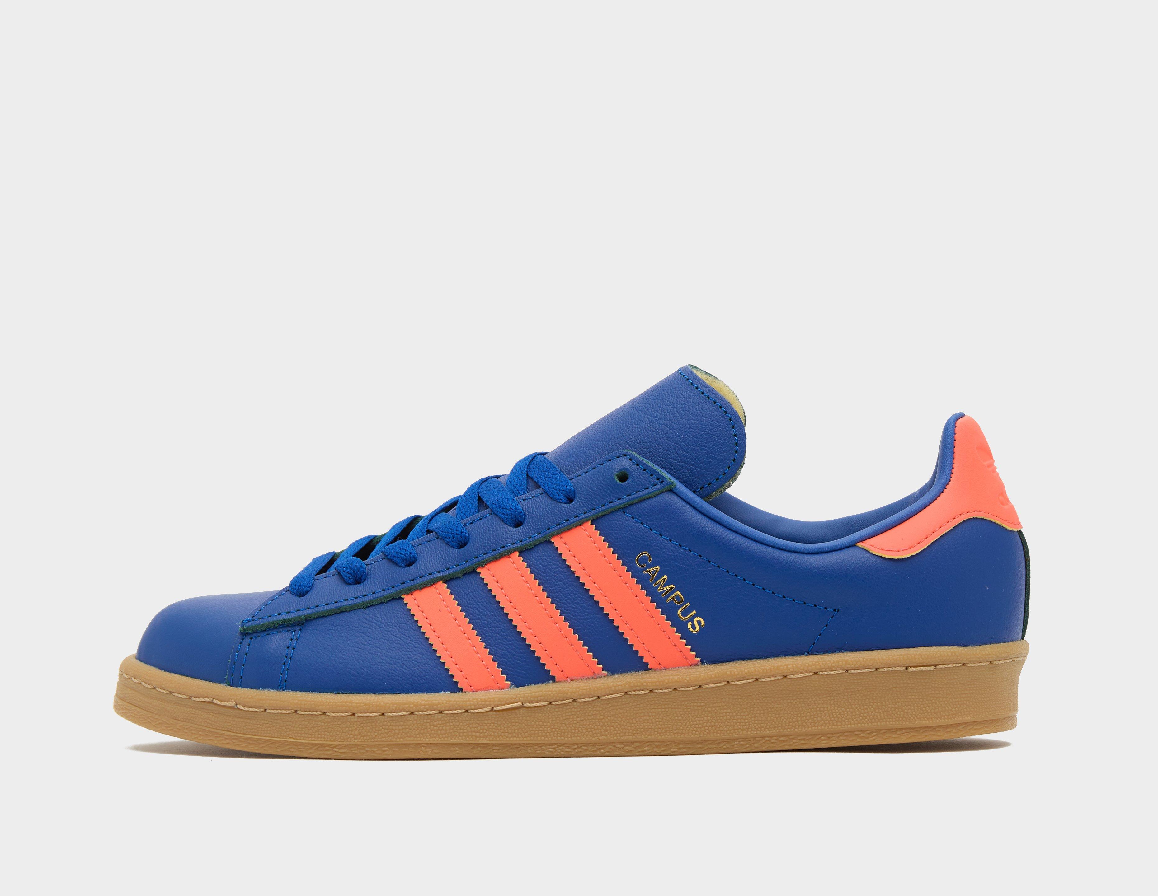 Adidas blue shoes with orange clearance laces