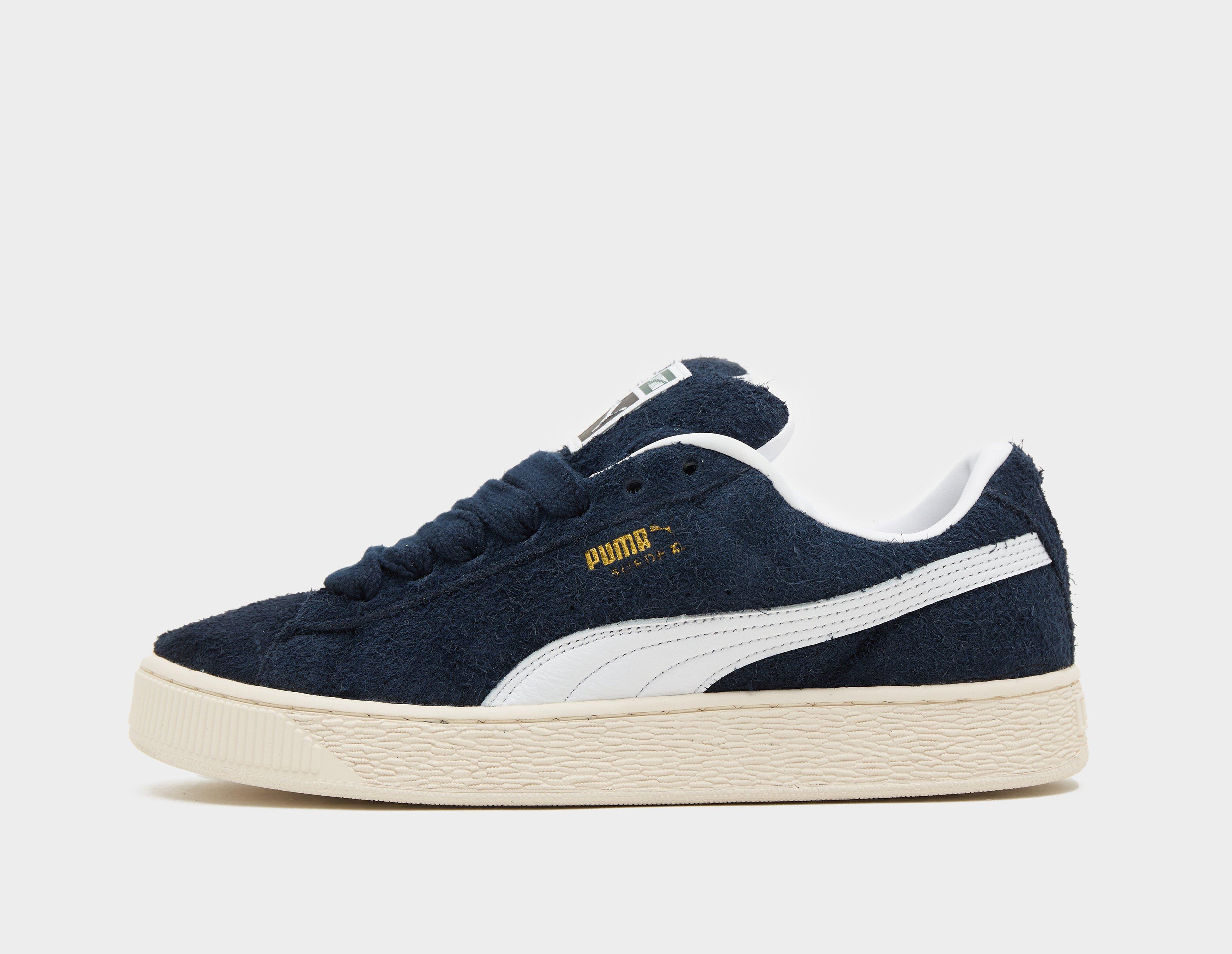 Blue and white store puma suede