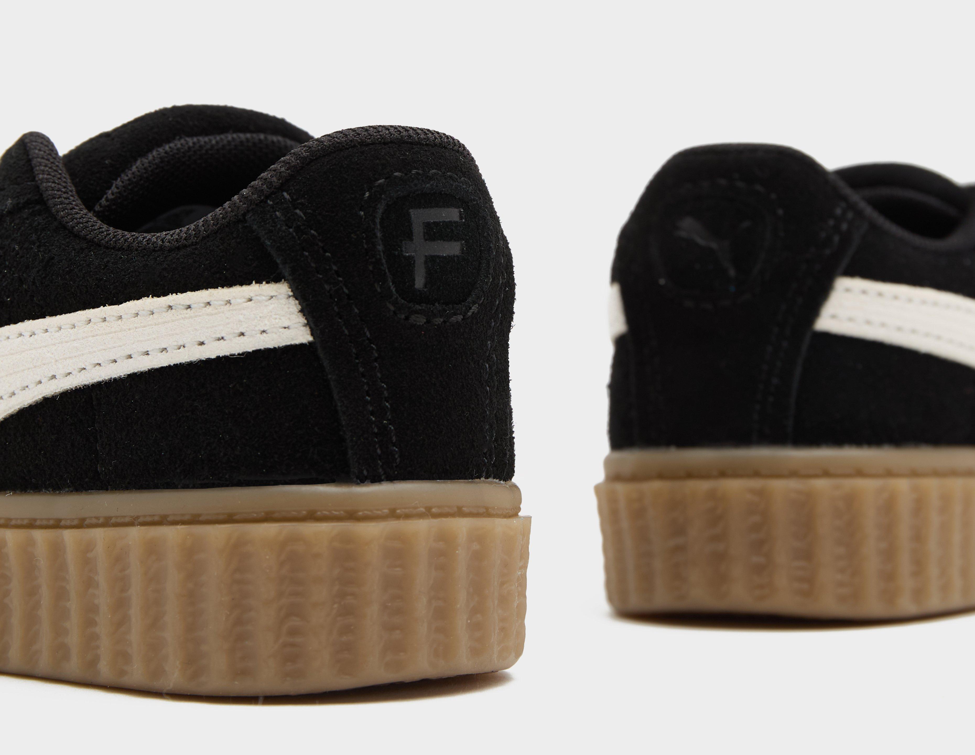 Puma creepers zwart outlet bruin