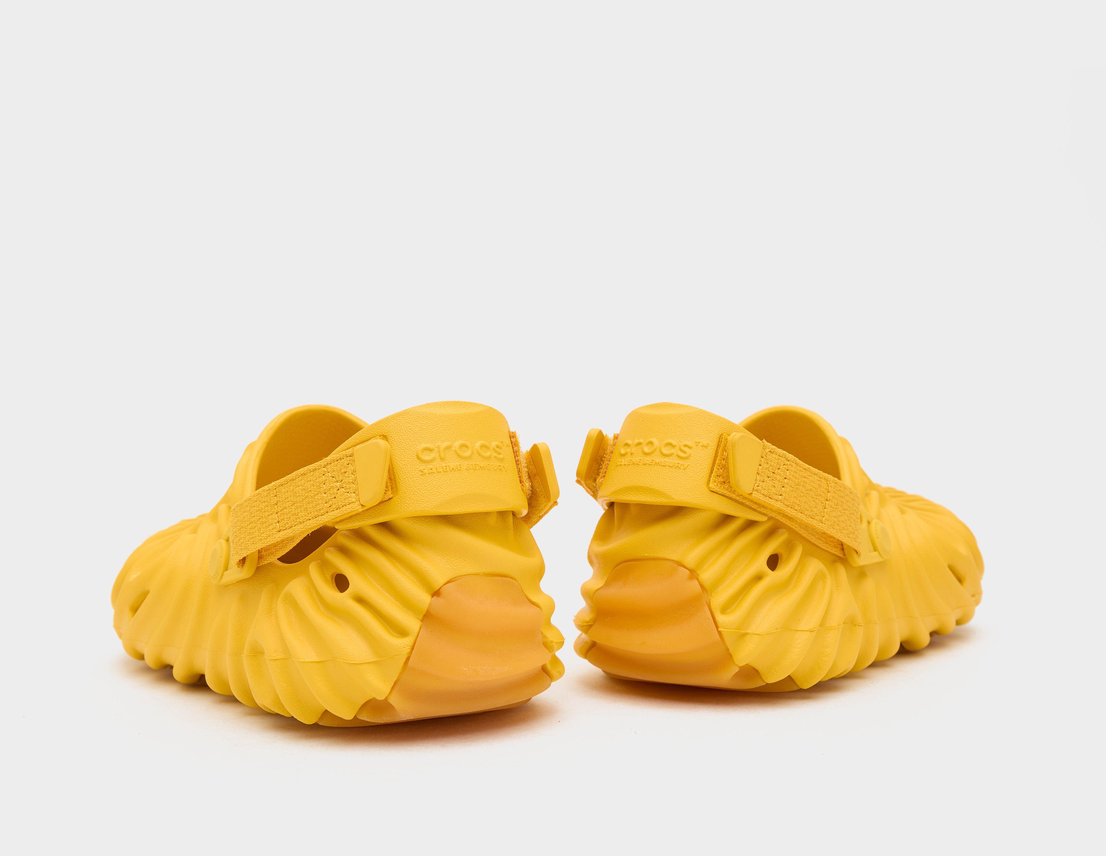 Yellow crocs on discount sale