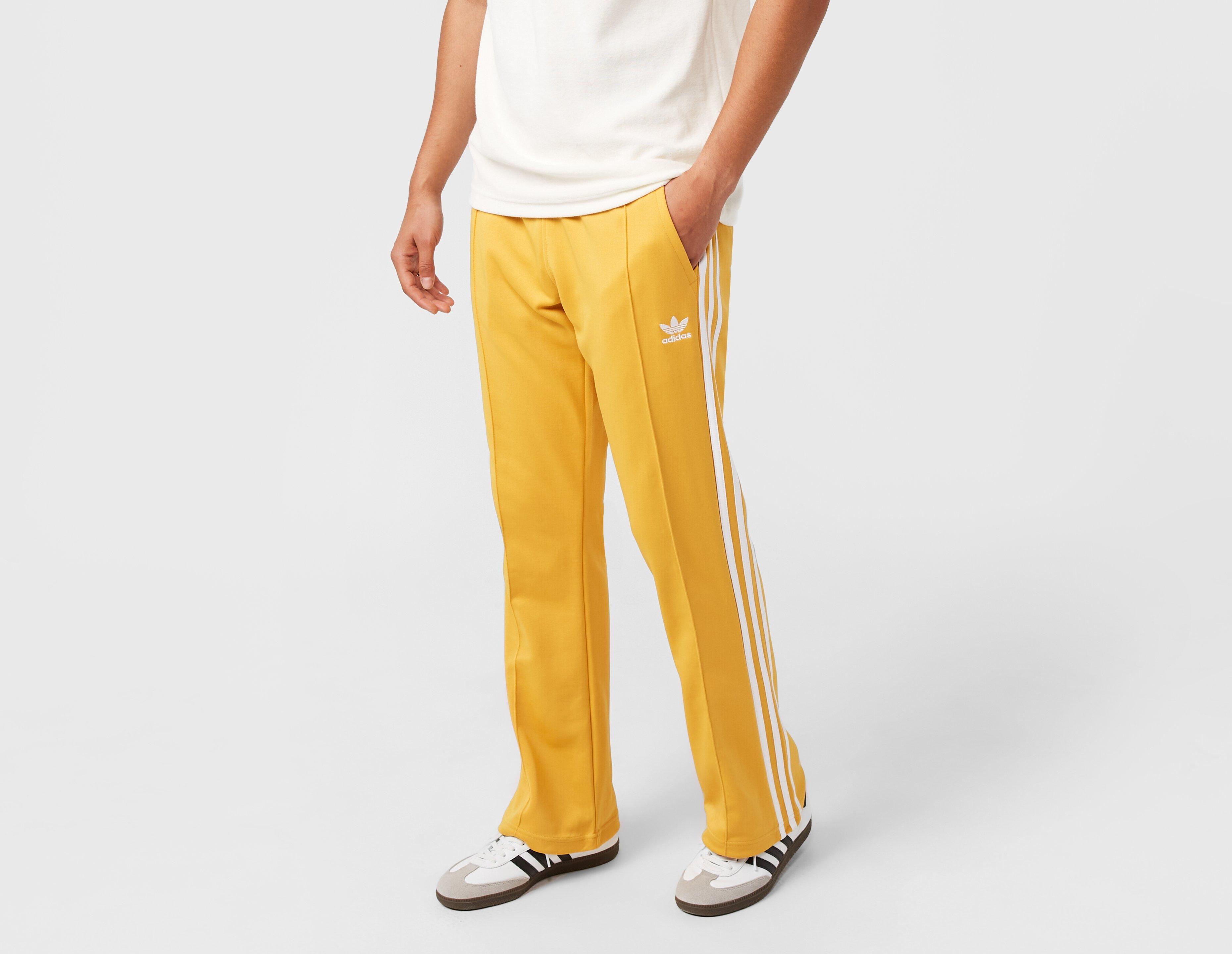Yellow adidas Originals Adicolor 70s Flare Track Pants | size? Ireland