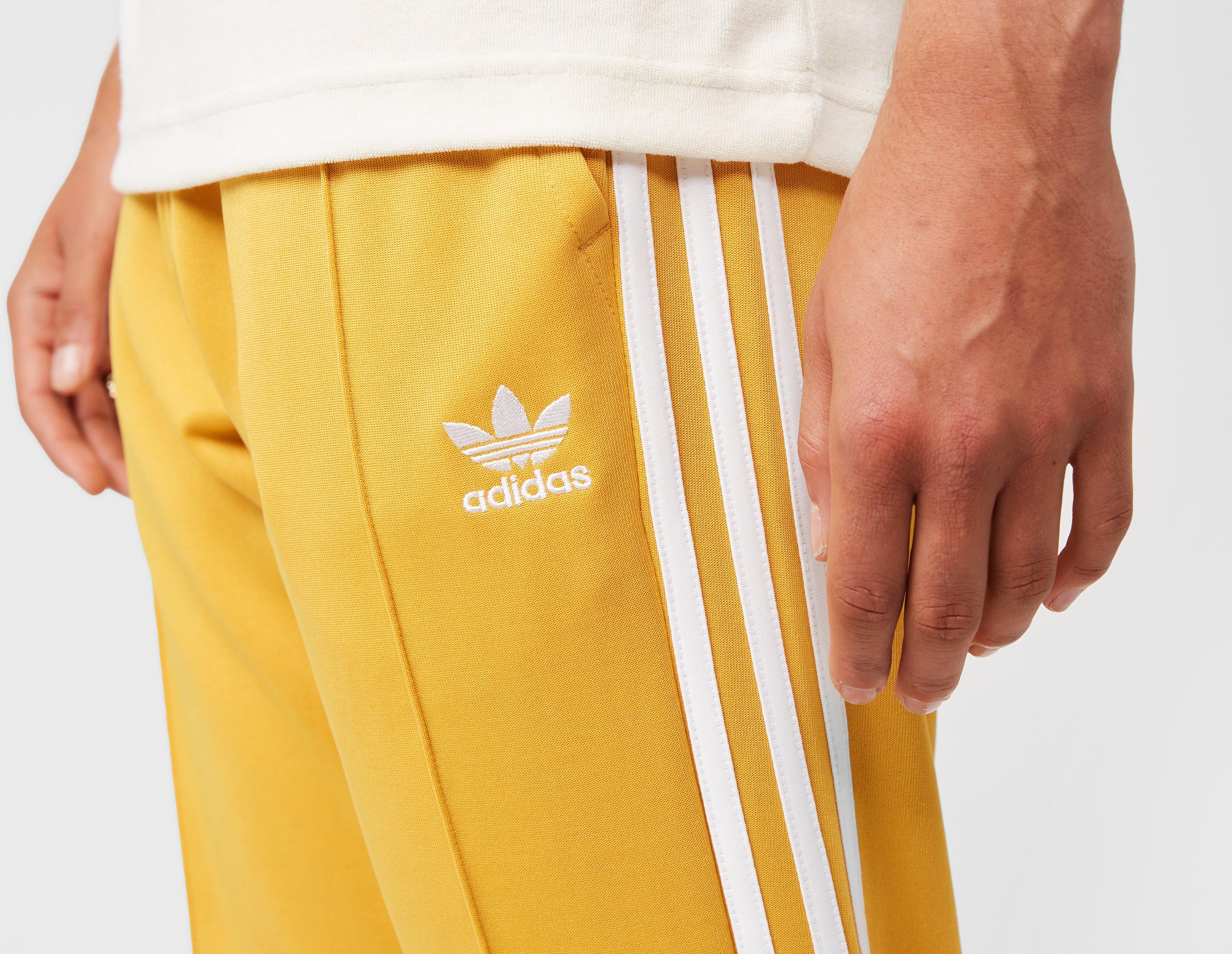 Adidas originals track pants yellow best sale