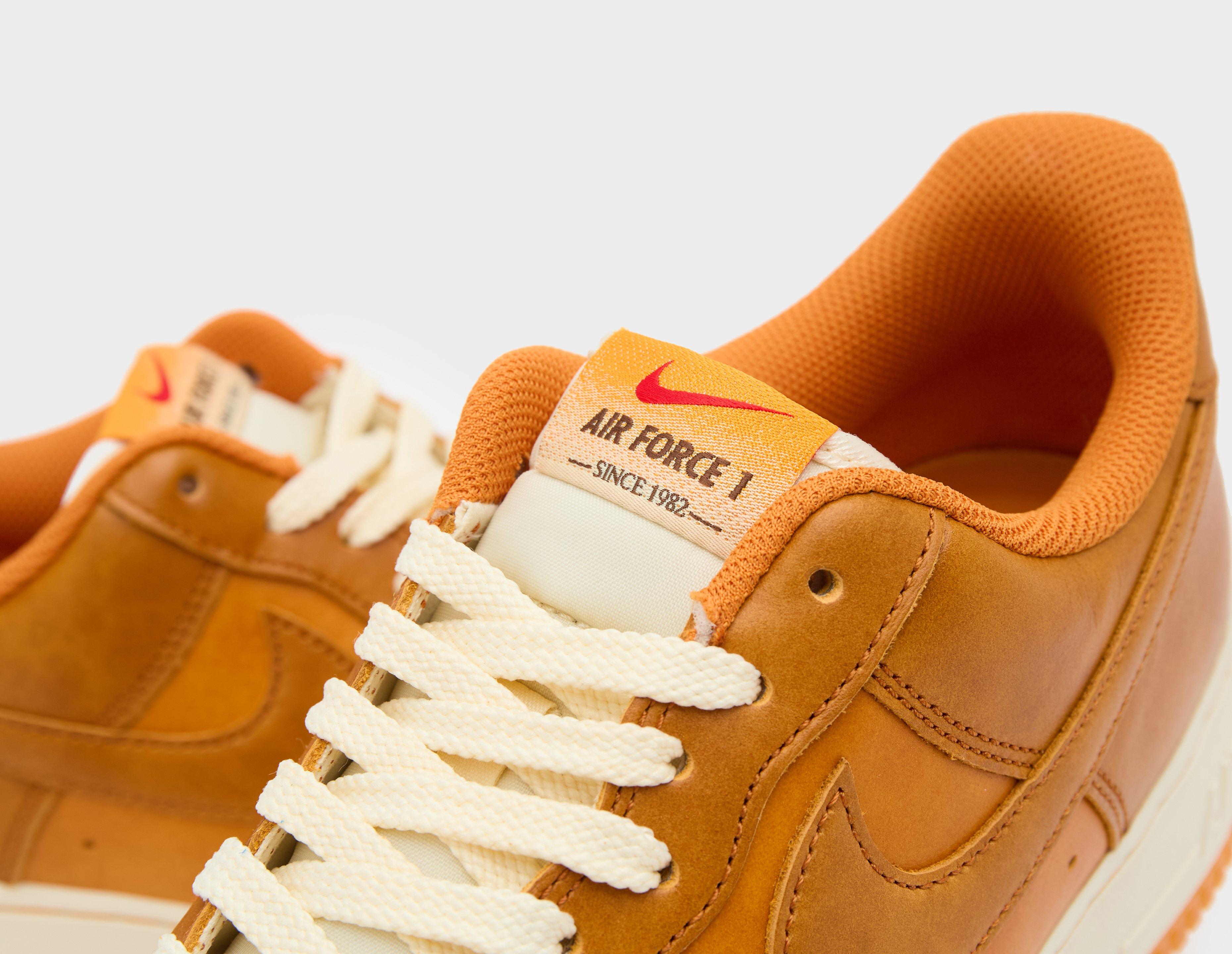 Orange nike air force sales