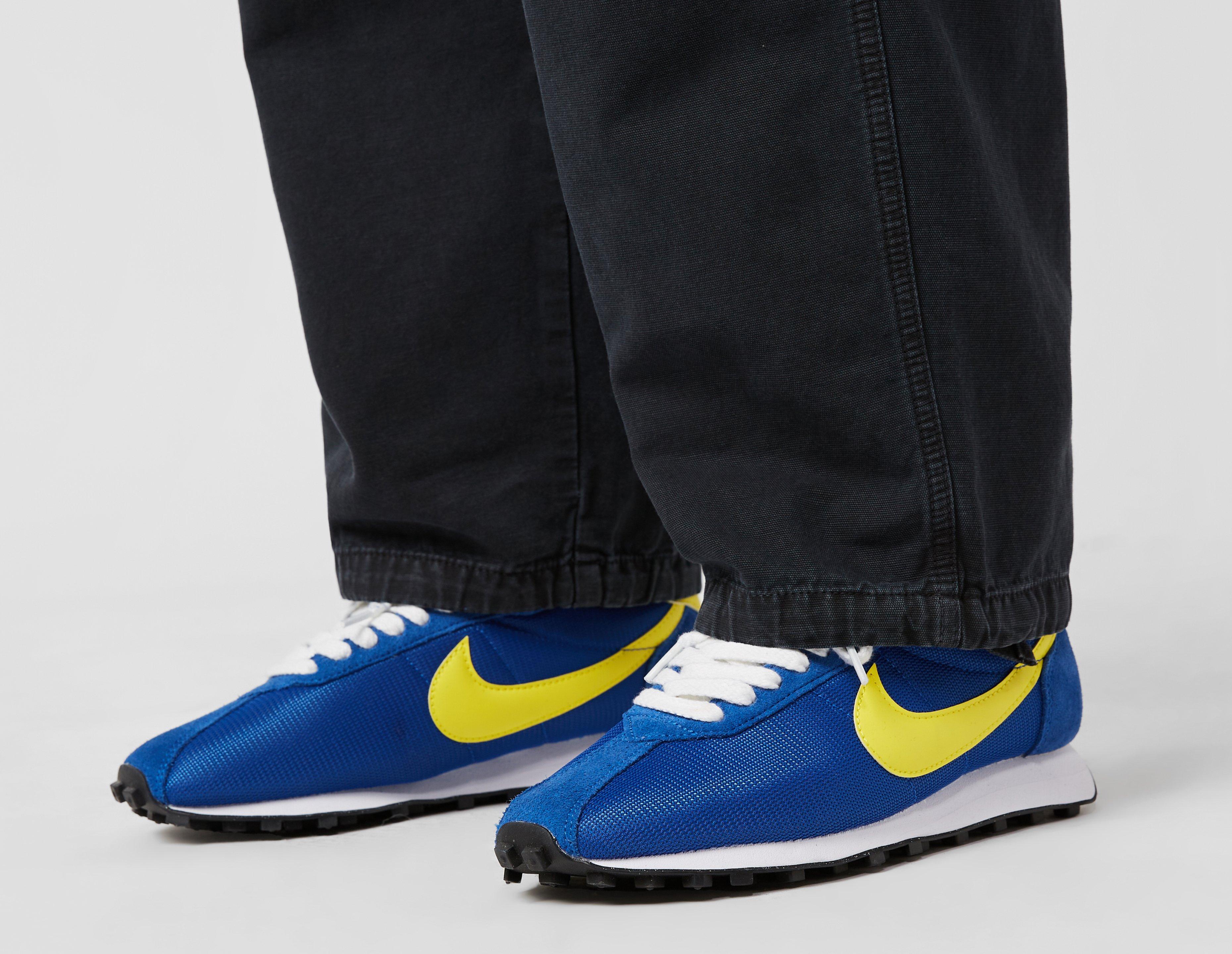 Nike cortez blue with yellow swoosh hotsell