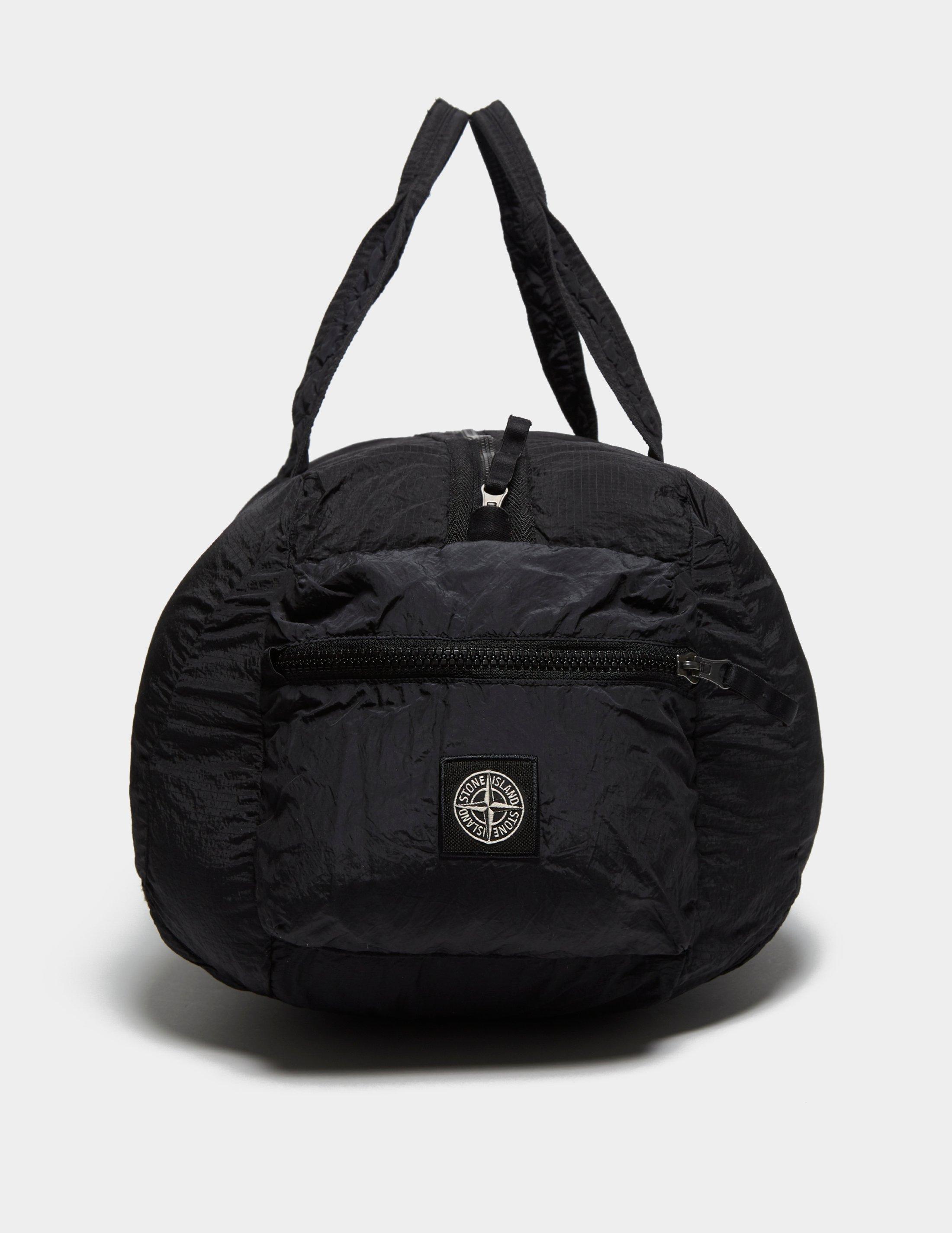 black nylon duffle bag