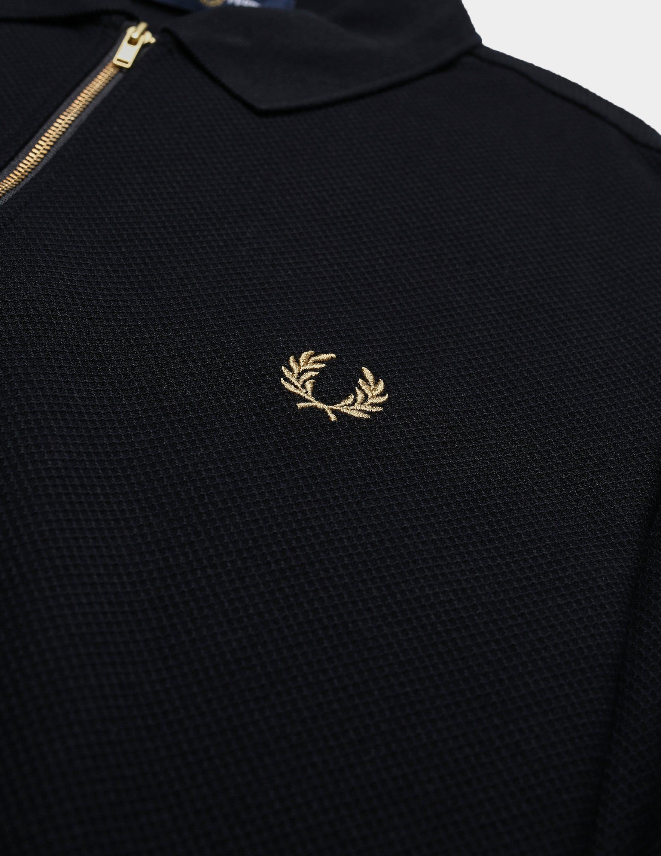 black and gold fred perry polo shirt