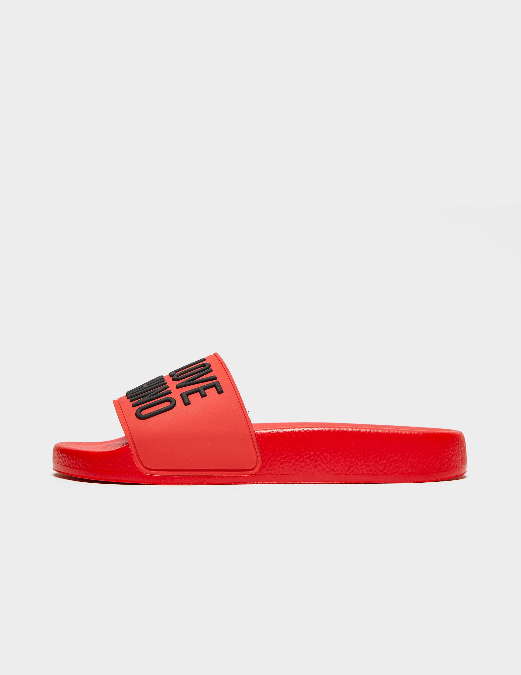 red moschino slides