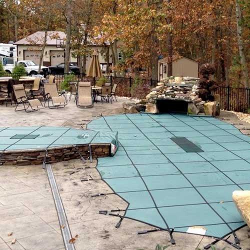 Leslie's  Pro Supreme Solid 20 x 40 Rectangle with 4 x 8 Center End Step Safety Cover with Kleen Screen Drain Green