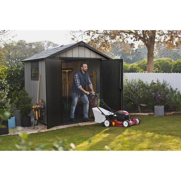 Keter  Oakland 7.5x7 Ft Large Resin Outdoor Shed with Customizable Walls Brown