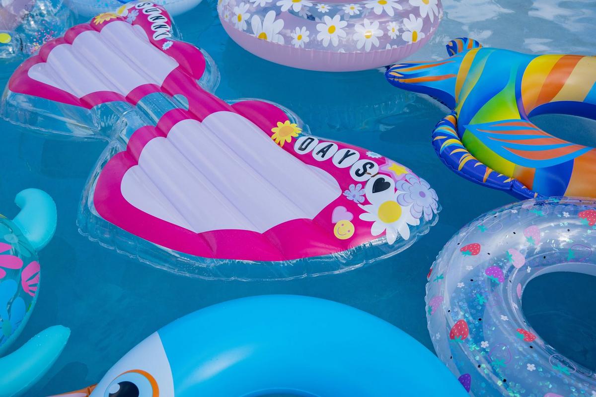 a background image representing Pool Floats & Toys