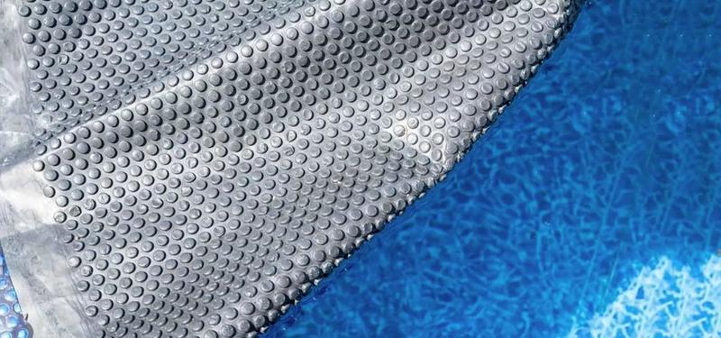 an image of Save Money and Extend Your Swim Season with a Solar Pool Cover