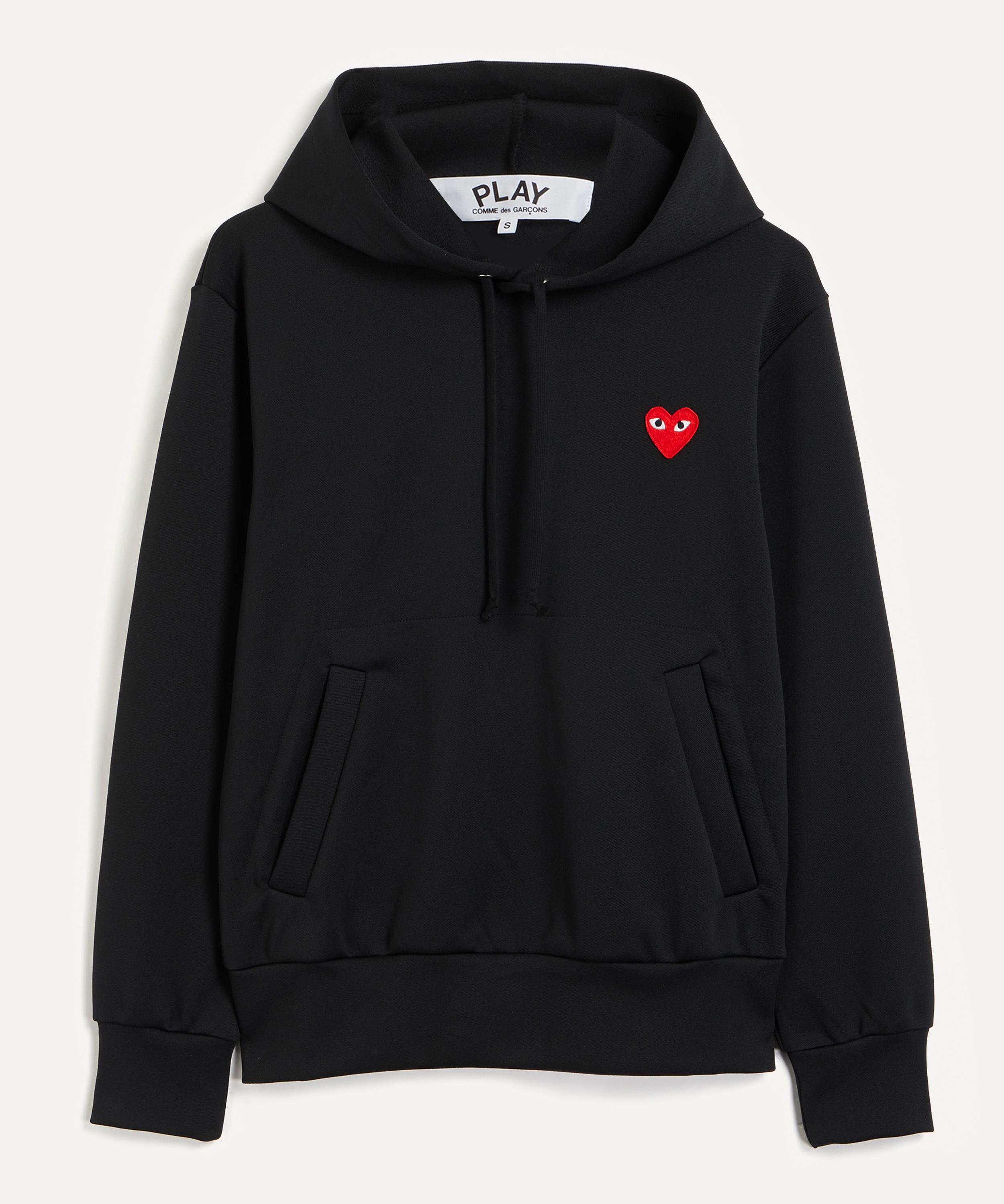 Comme des garcons outlet zip hoodie que significa