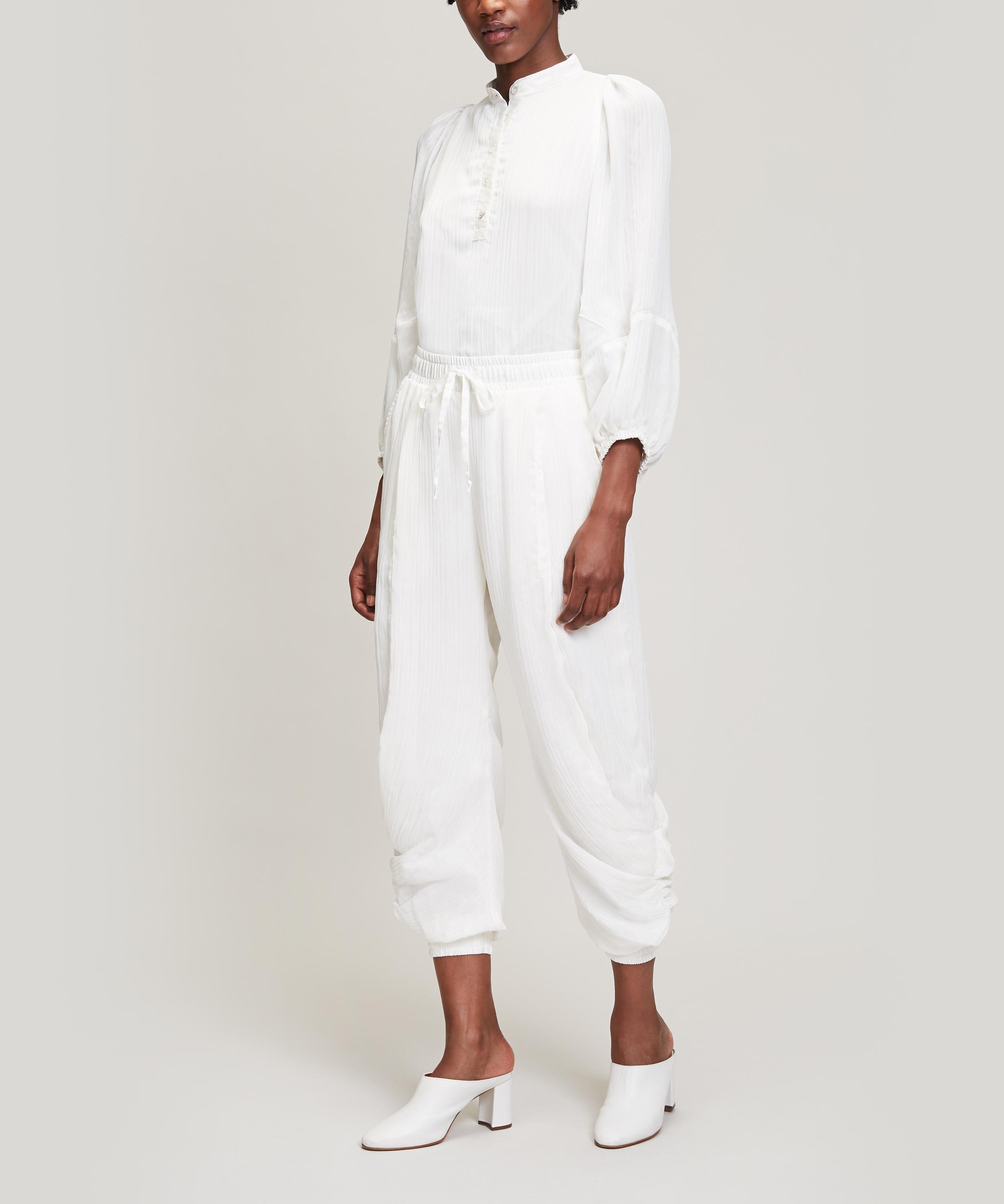 white chiffon trousers