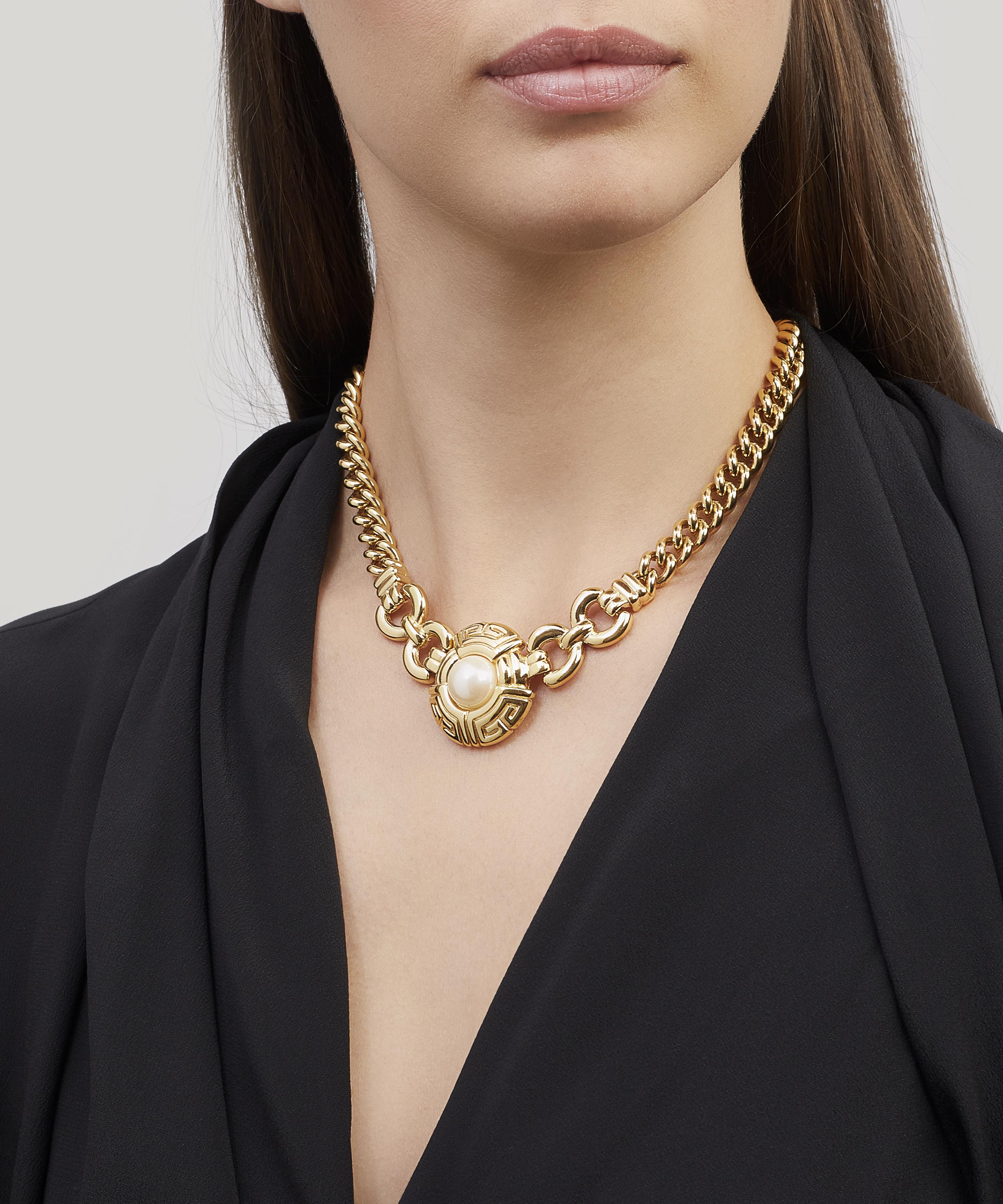 Designer Vintage - 1980s Givenchy Gilt Faux Pearl Necklace image number 1