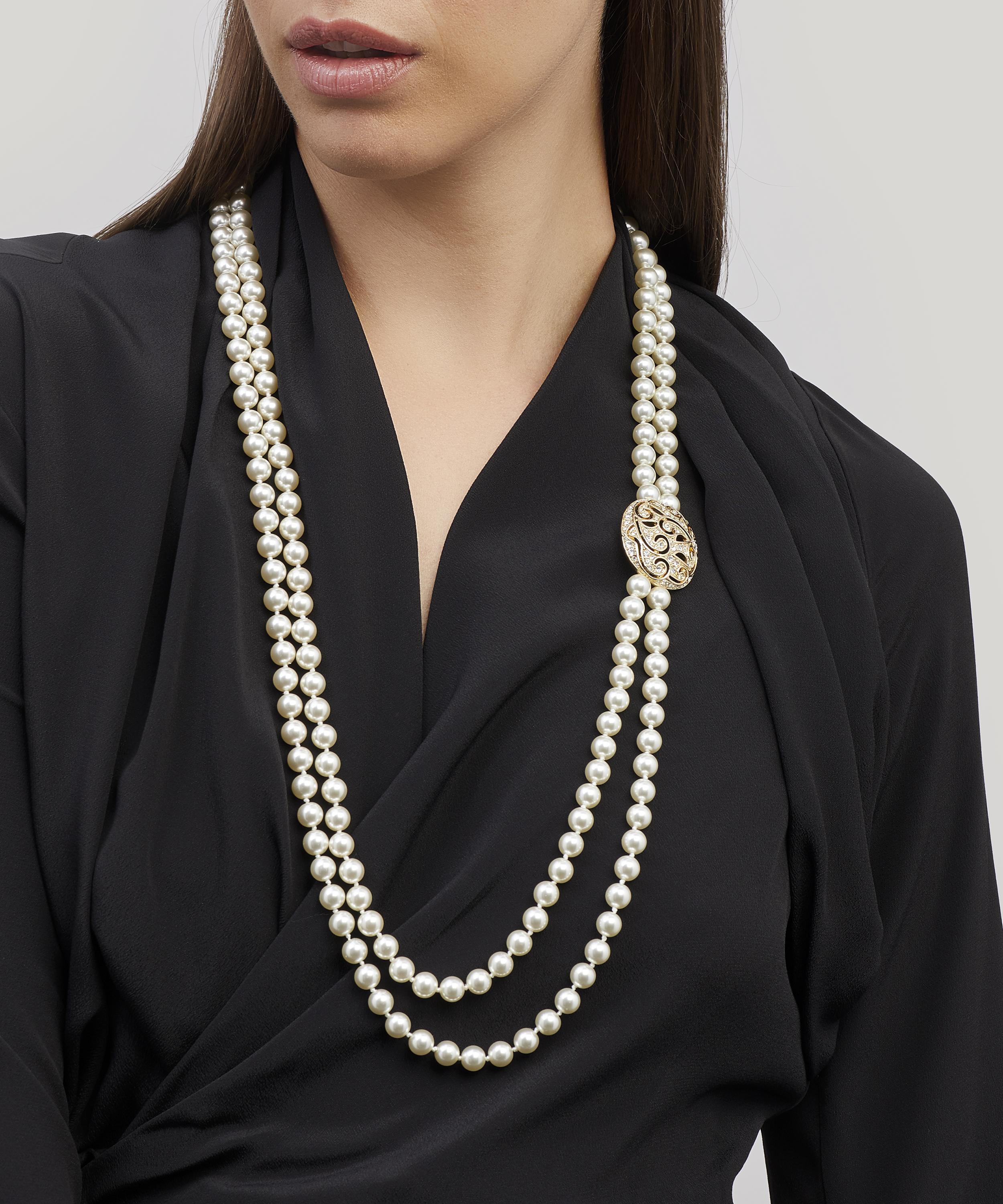 Designer Vintage - 1980s Gilt Faux Pearl and Diamond Necklace image number 1