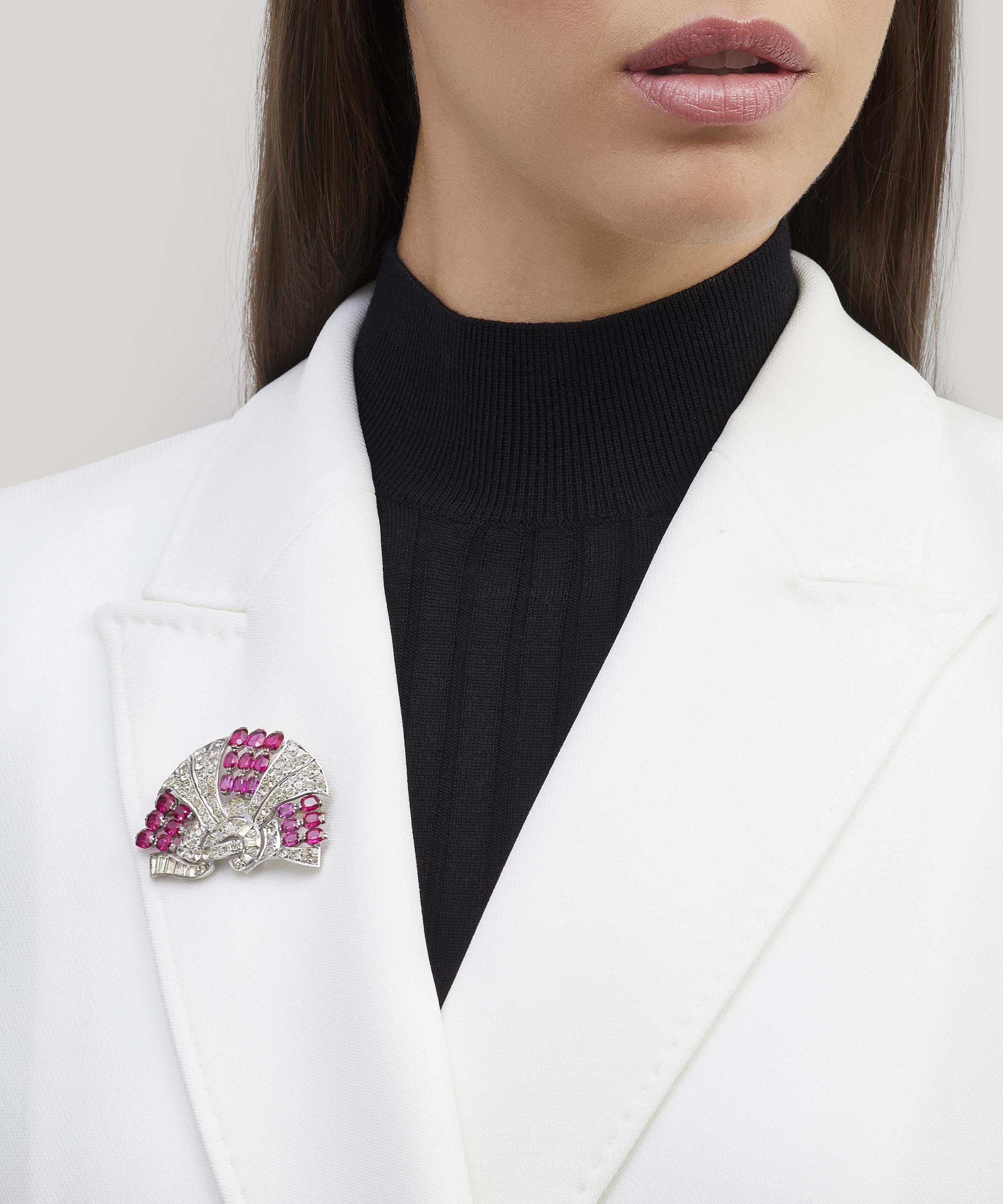 Designer Vintage - 1930s White Metal Faux Diamond and Ruby Brooch image number 1