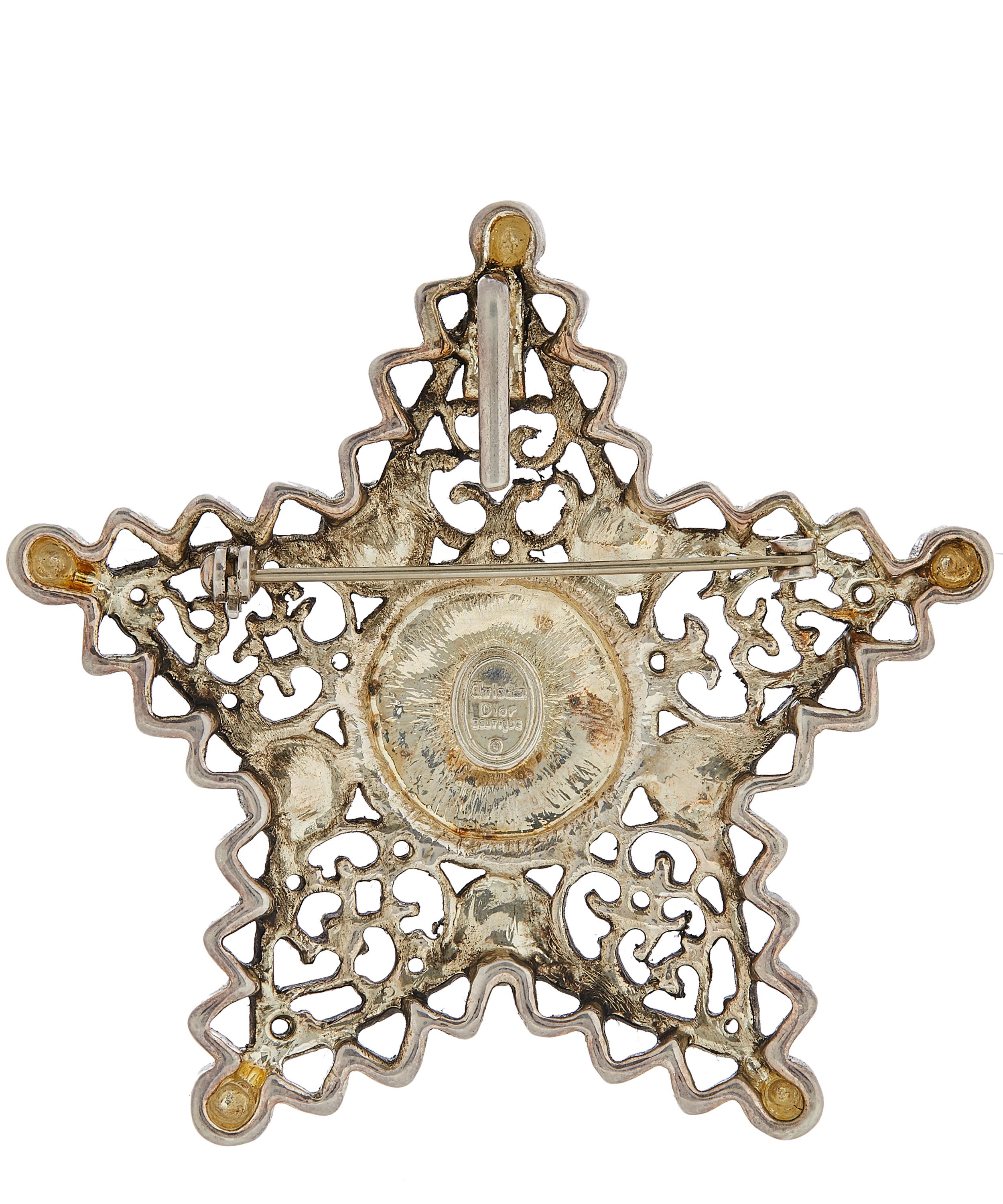 Designer Vintage - 1980s Christian Dior White Metal Horn and Faux Diamond Star Brooch image number 3