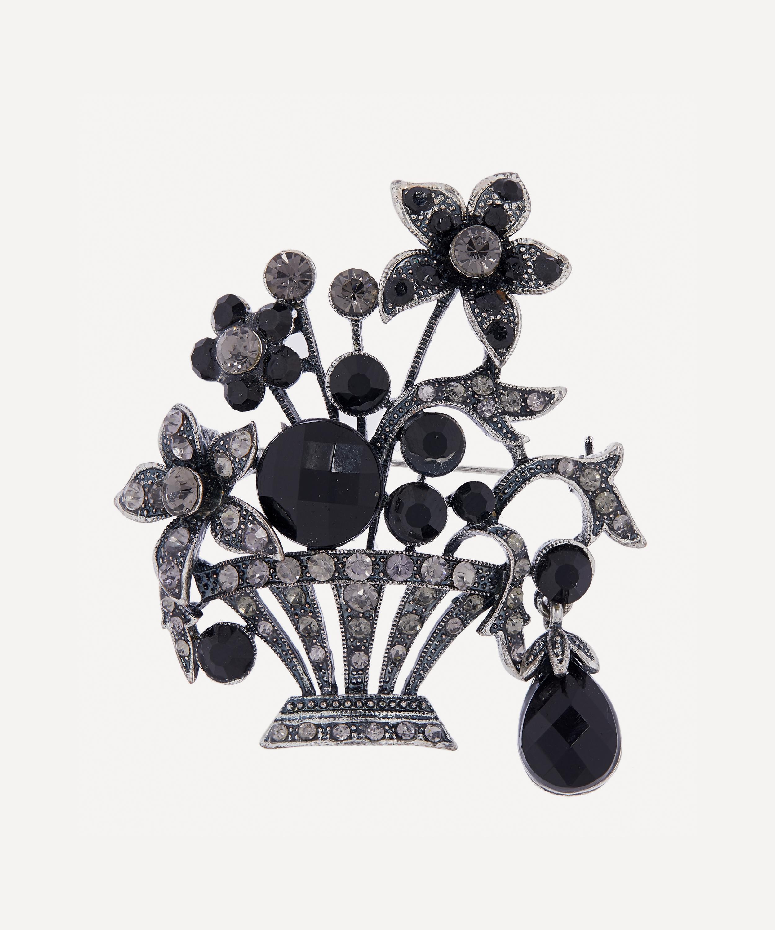 Designer Vintage - 1950s White Metal Faux Diamond and Black Jet Floral Brooch image number 0