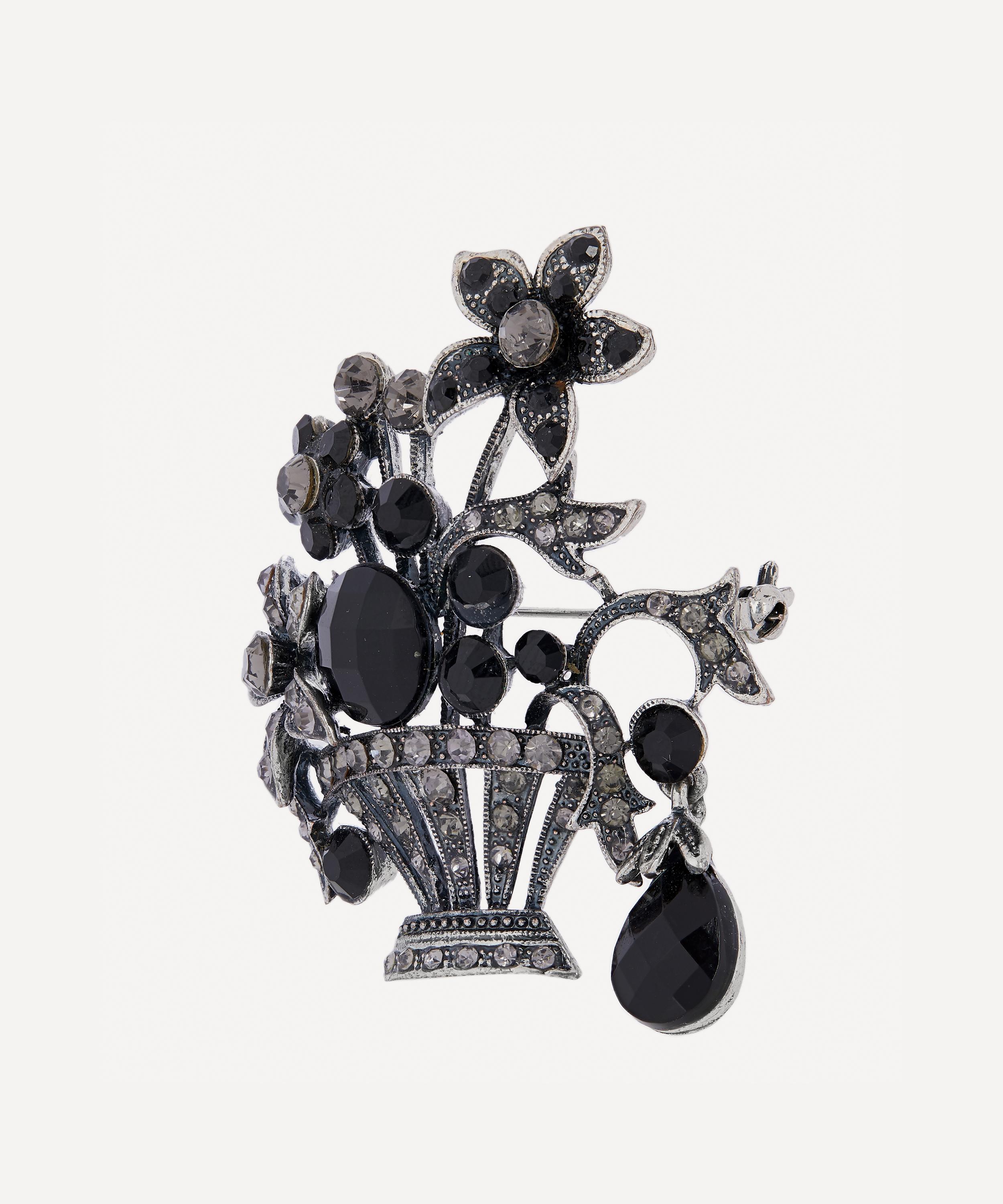 Designer Vintage - 1950s White Metal Faux Diamond and Black Jet Floral Brooch image number 2