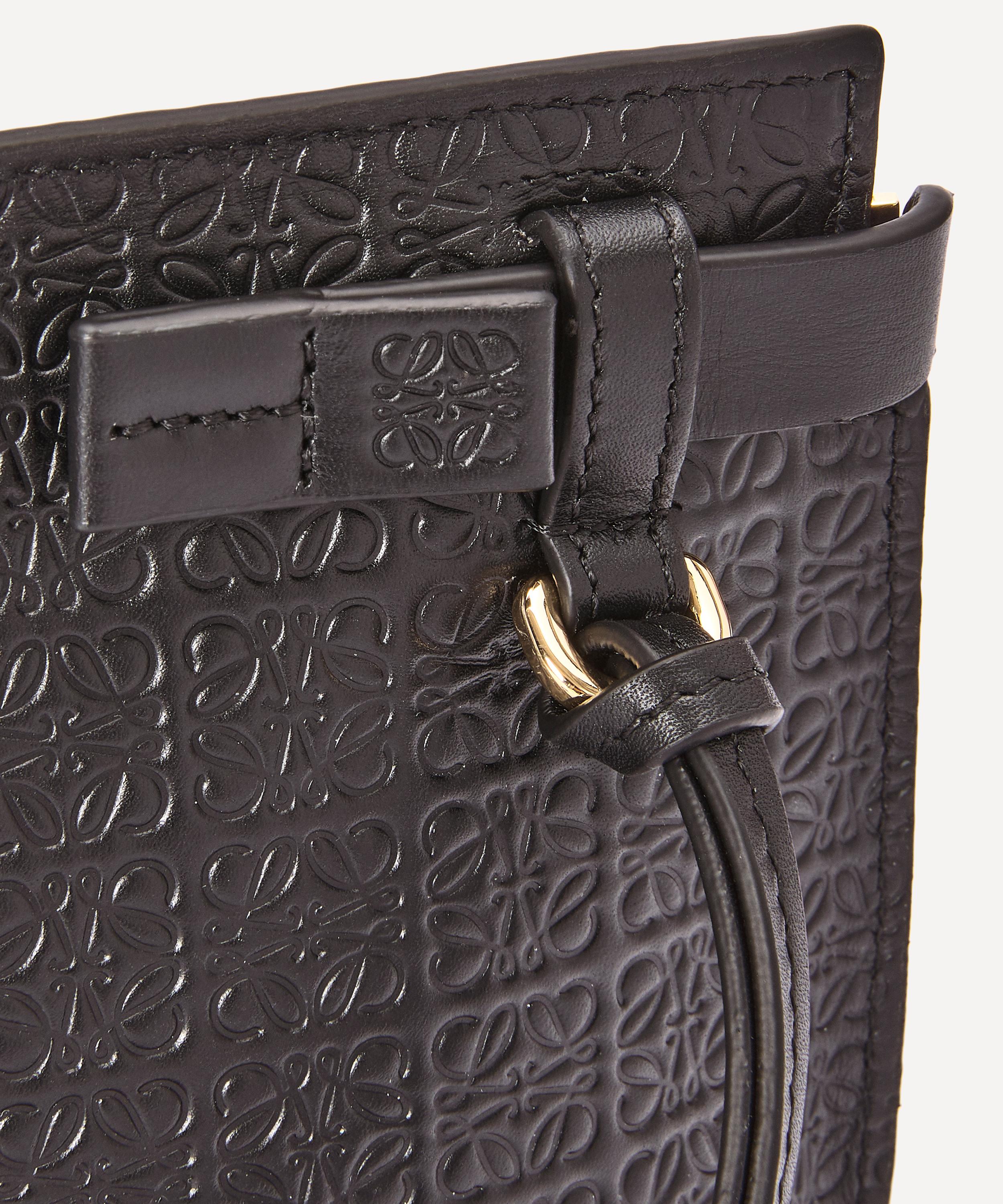 Loewe repeat mini discount debossed leather pouch