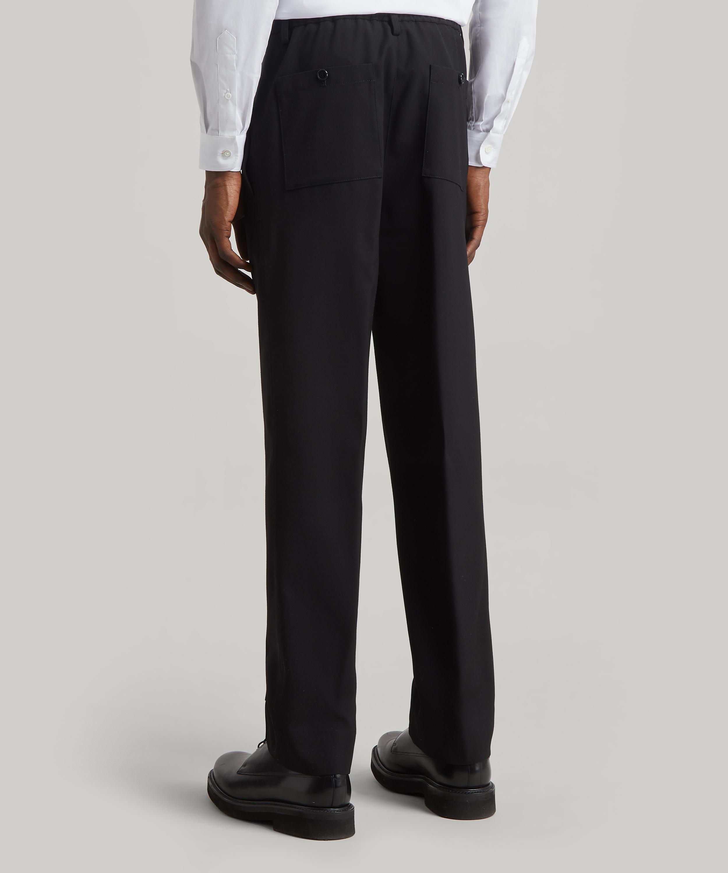 Ami Grey Slim Fit Wool Trousers, $225, oki-ni