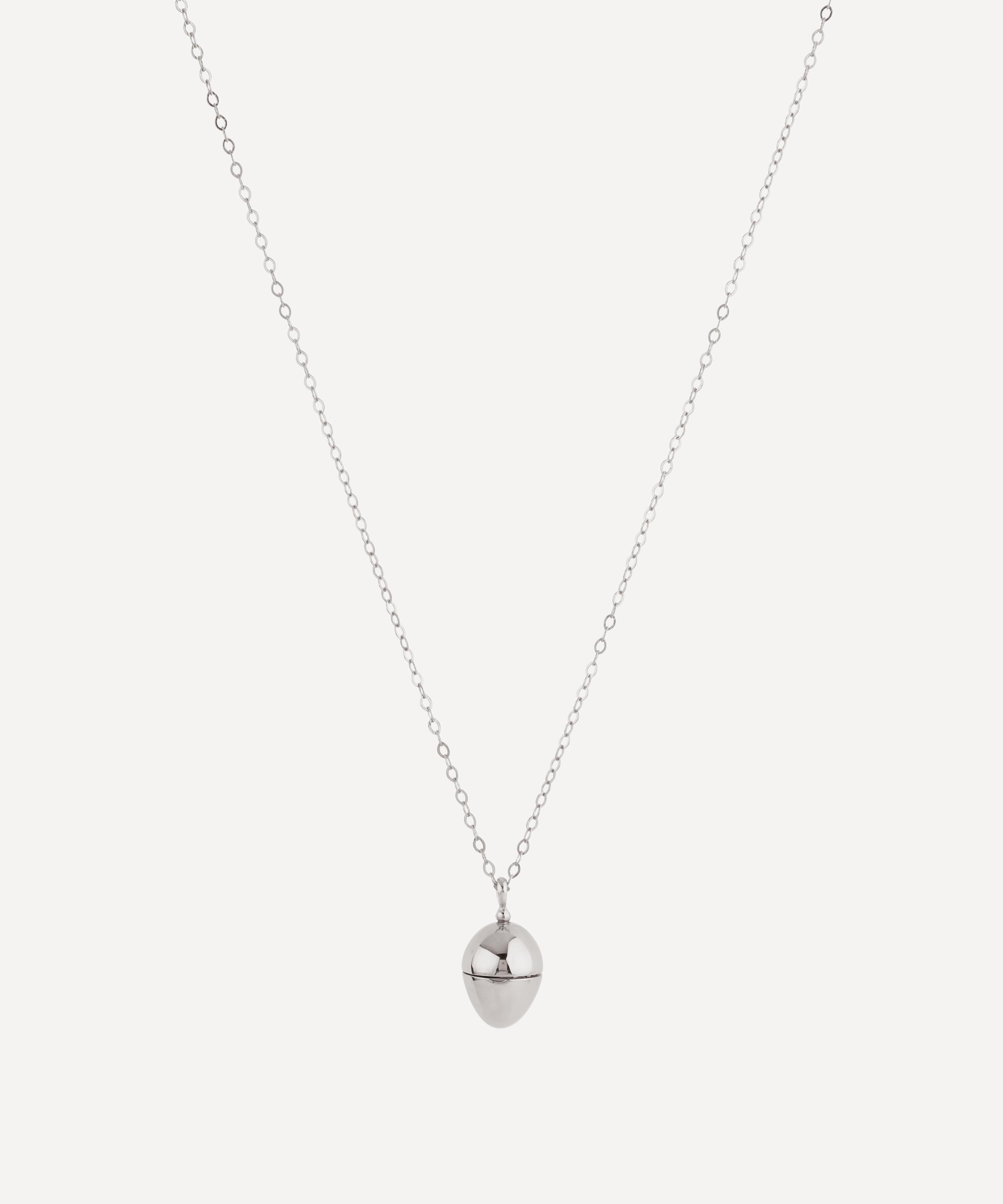 Dinny Hall - Silver Egg Locket and Clover Charm Necklace image number 0