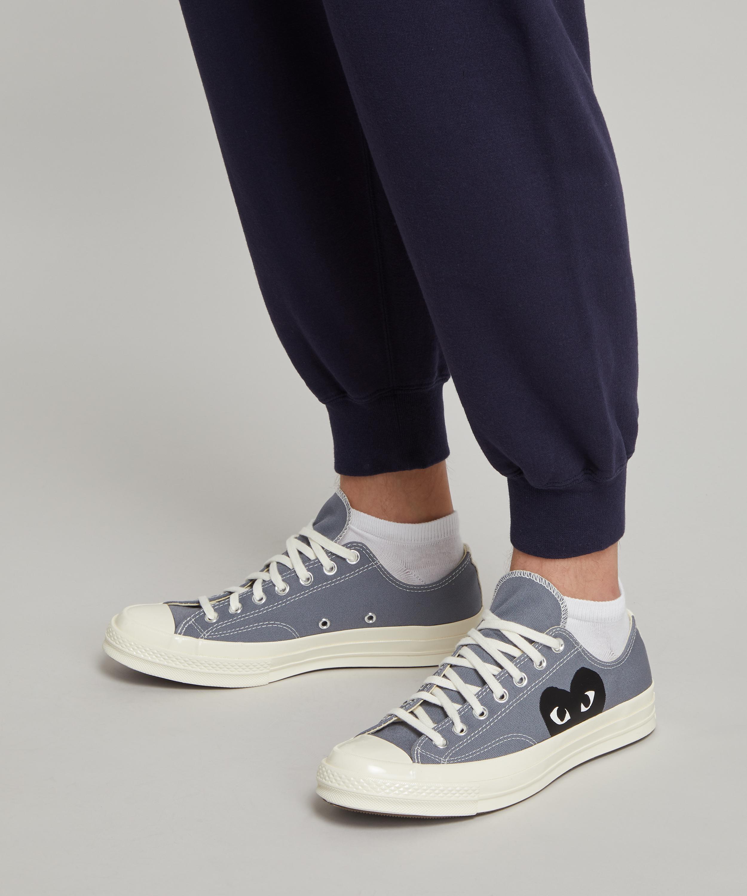 Converse low top on feet on sale