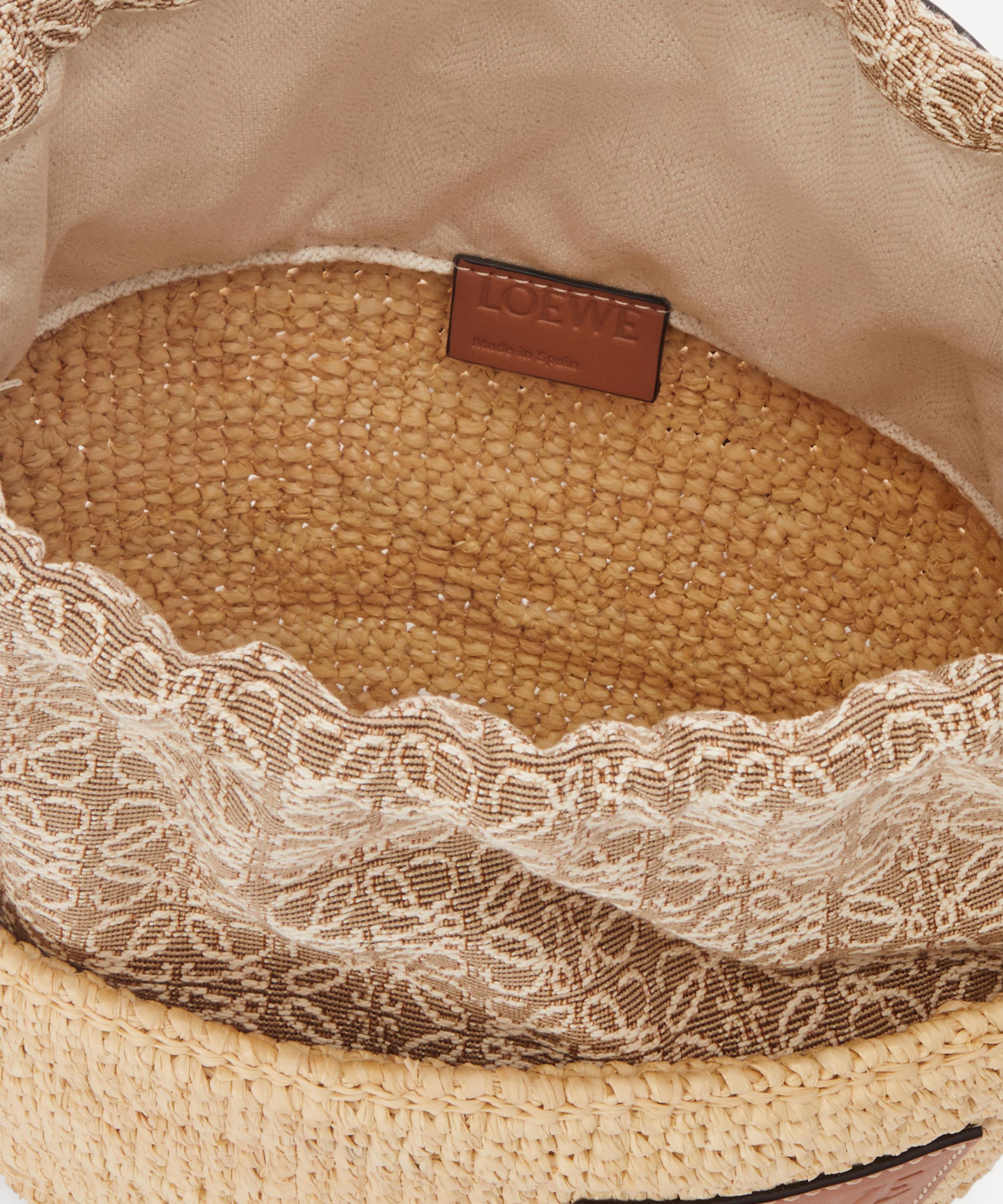 Pochette bag in raffia, Anagram jacquard and calfskin