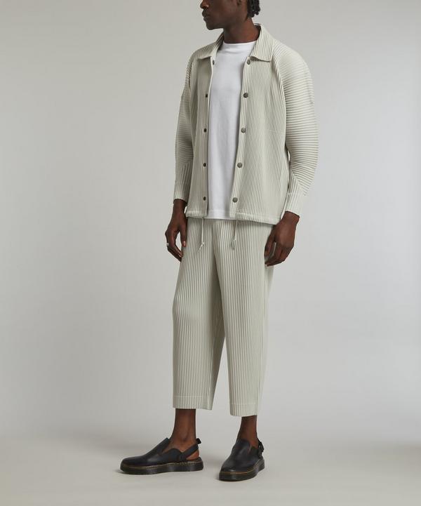 HOMME PLISSÉ ISSEY MIYAKE MC AUGUST Pleated Coach Jacket HOMME PLISSÉ ISSEY MIYAKE MC AUGUST Pleated Coach Jacket