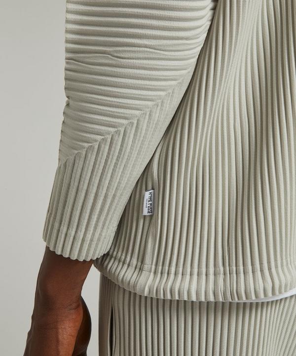 HOMME PLISSÉ ISSEY MIYAKE MC AUGUST Pleated Coach Jacket HOMME PLISSÉ ISSEY MIYAKE MC AUGUST Pleated Coach Jacket