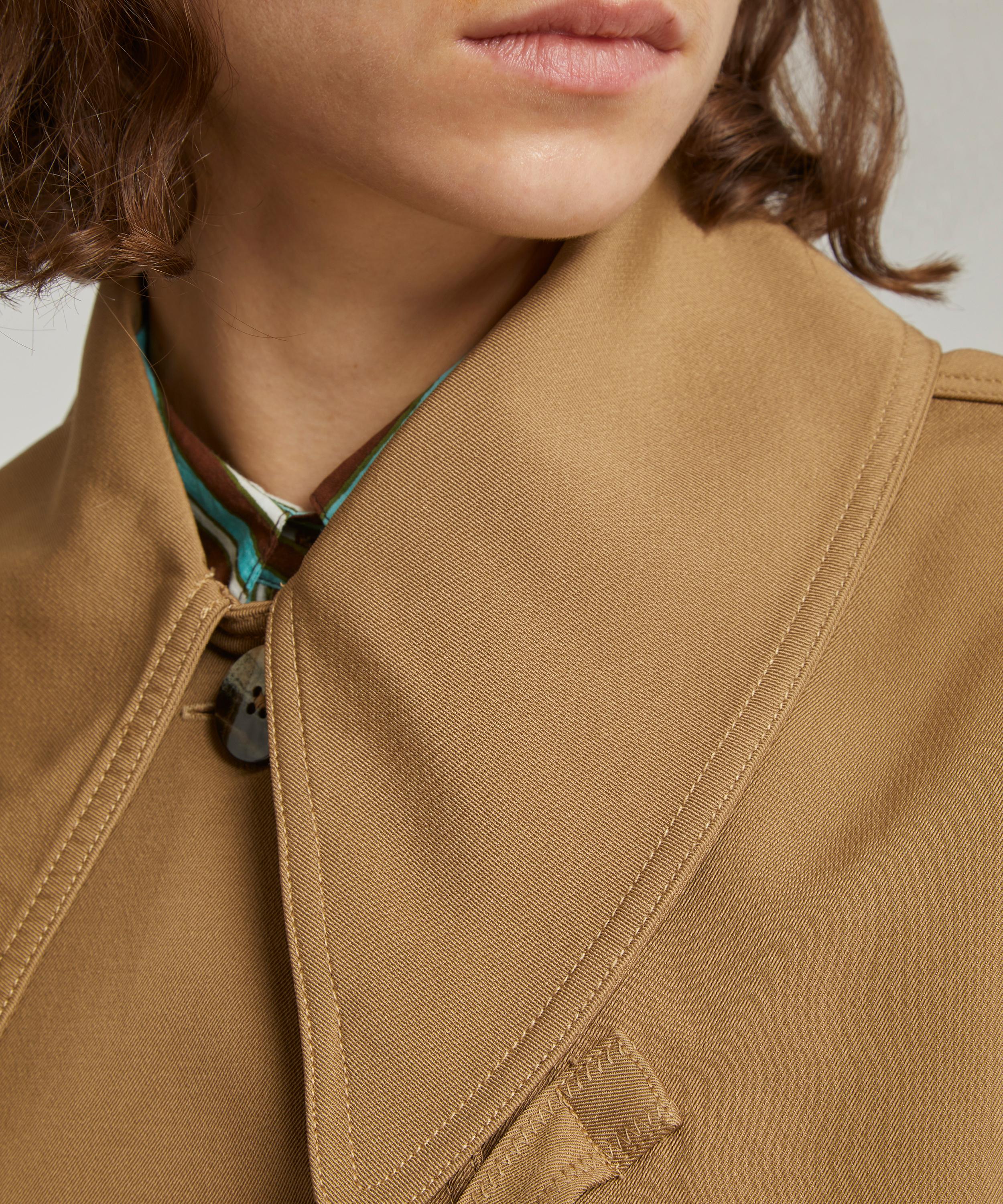 The EDGE asymmetrical coat is perfect for in-between fall days.