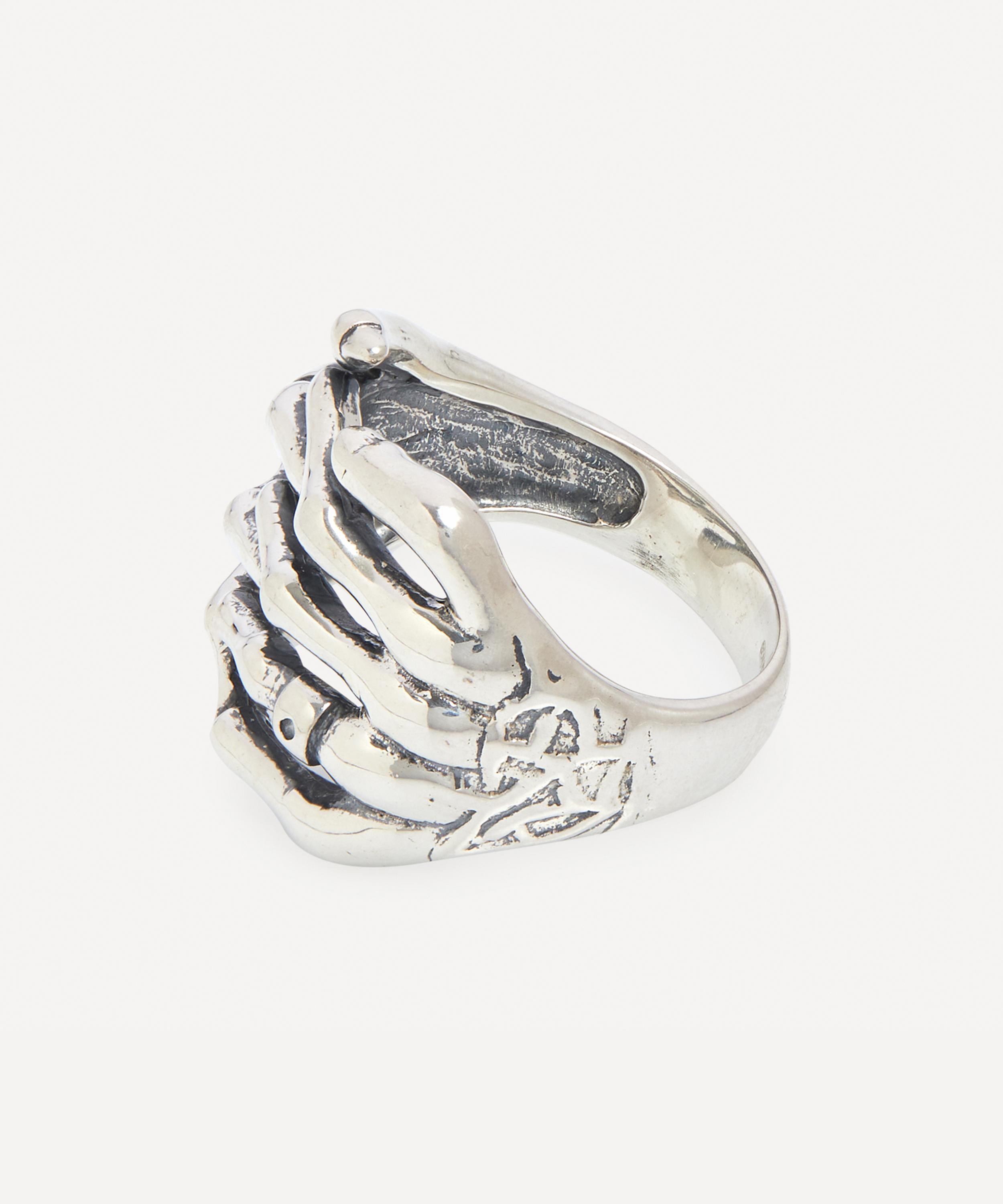 Serge denimes deals skeleton hands ring