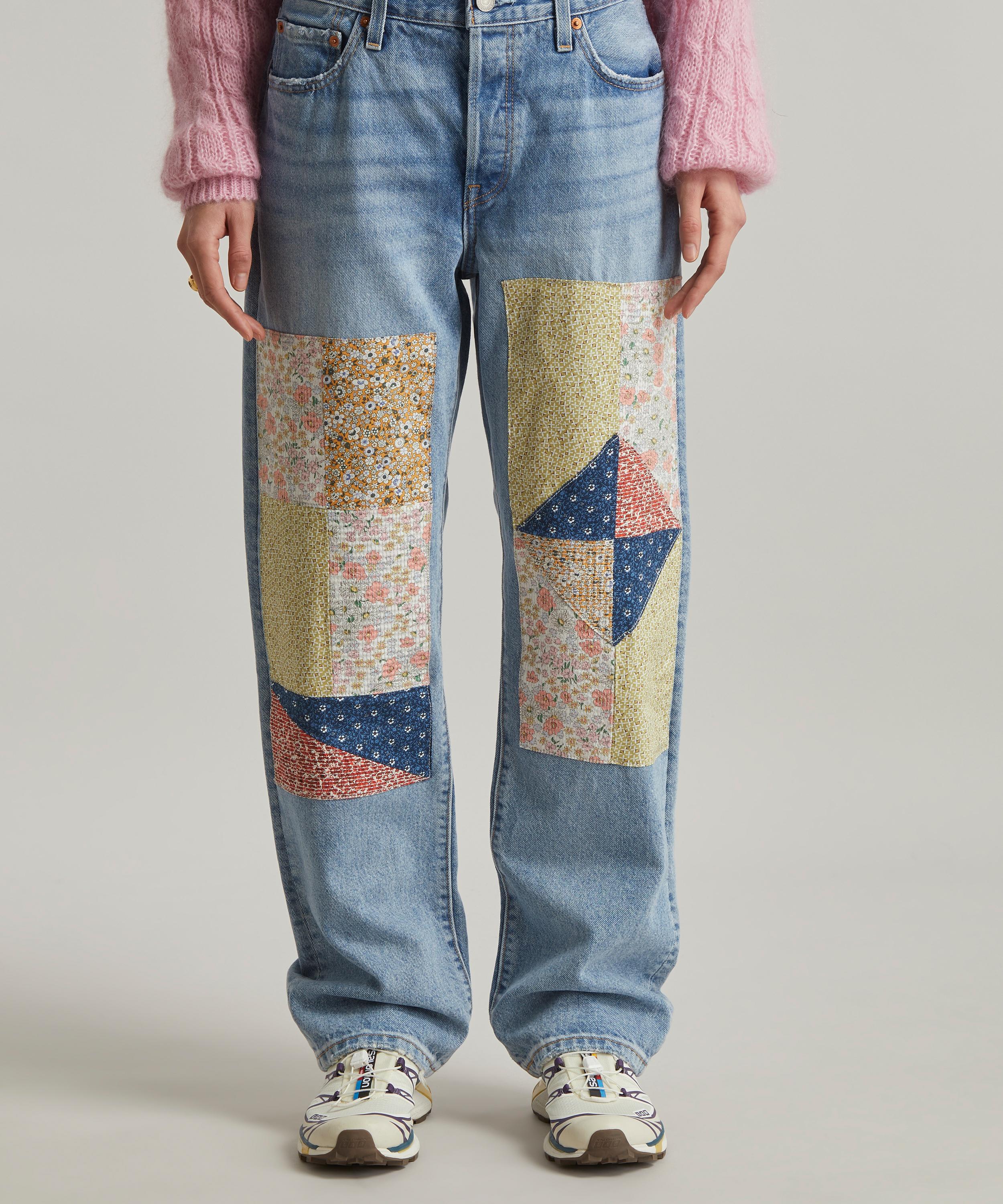 Levi's jeans with store patches