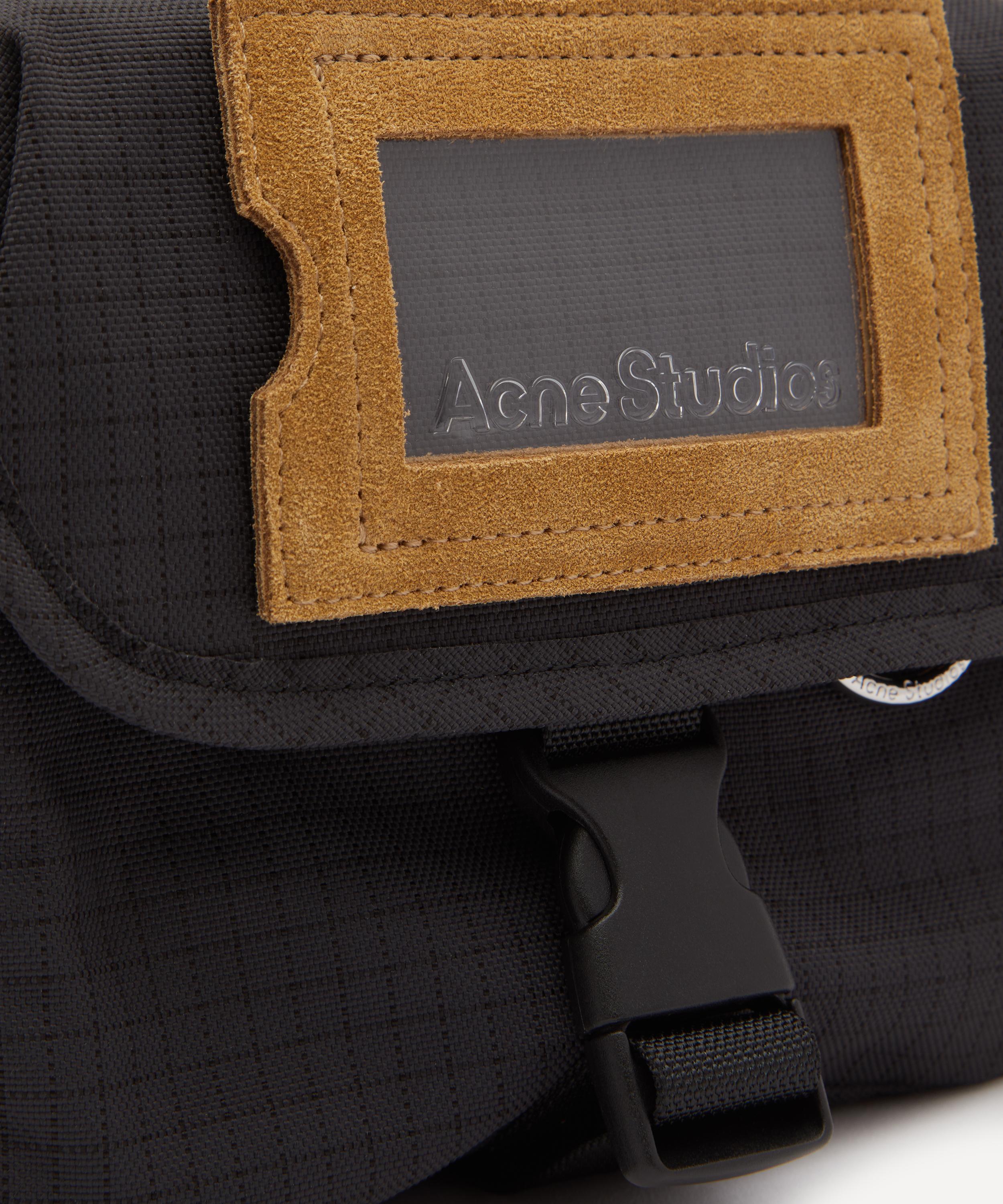 Logo-Embossed Suede-Trimmed Nylon-Ripstop Messenger Bag