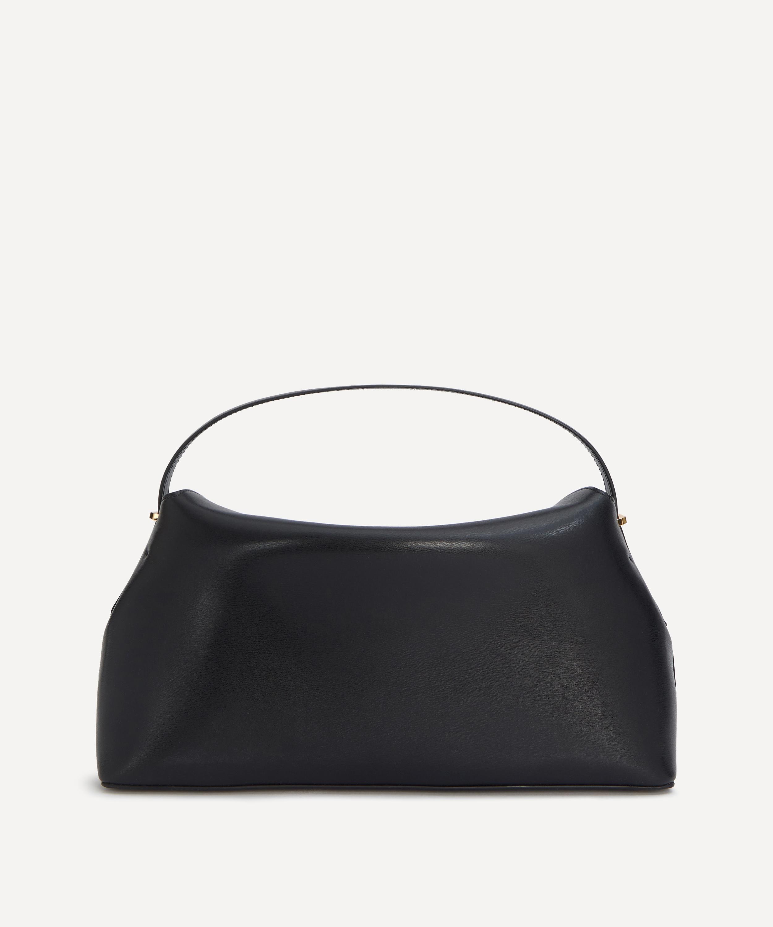 VIP【関税送料無料】希少 Toteme T-Lock handbag T-Lock Medium leather tote bag in black - Toteme | Mytheresa
