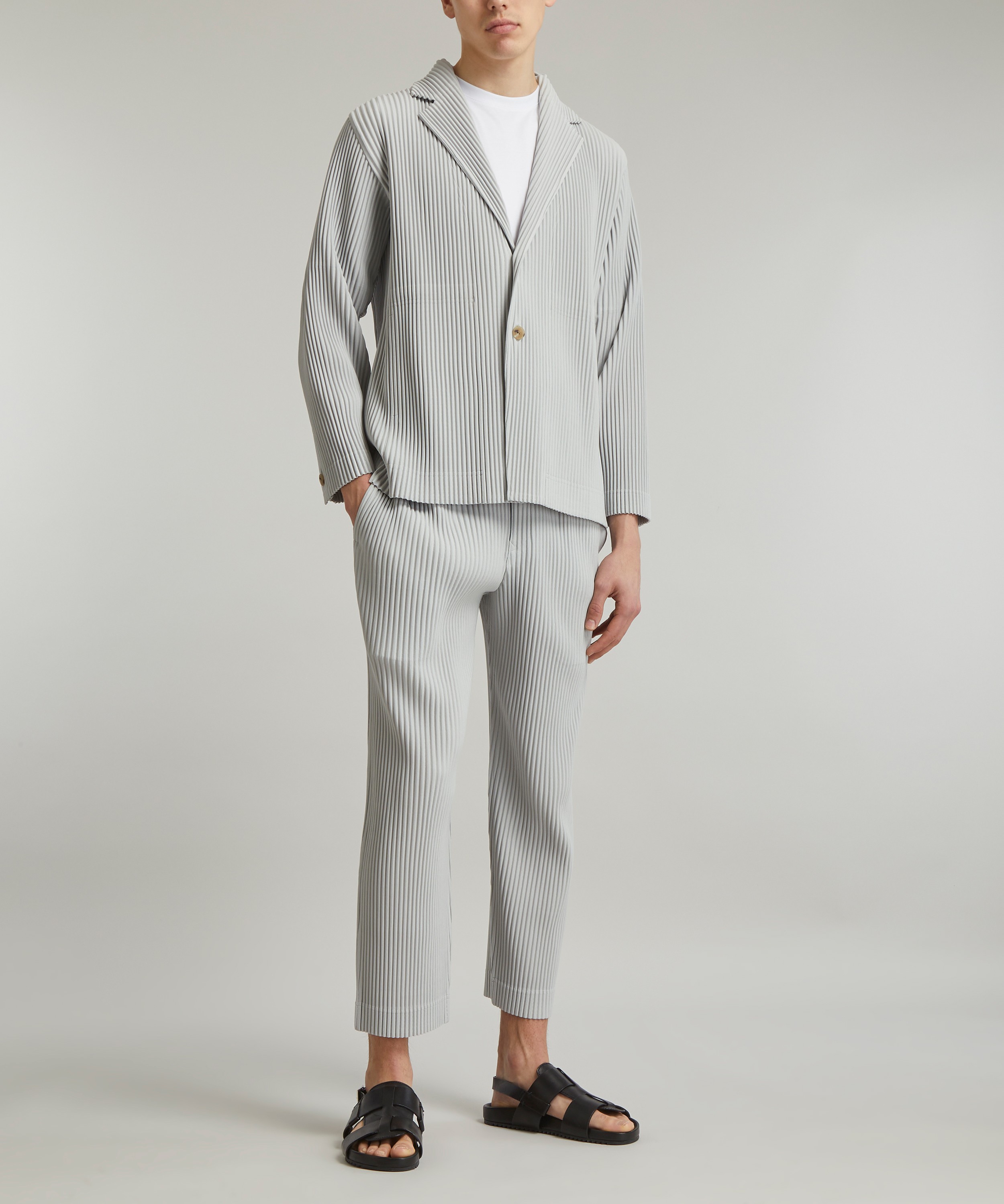 HOMME PLISSÉ ISSEY MIYAKE - Core Pleated Straight Leg Trousers image number 1
