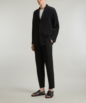 HOMME PLISSÉ ISSEY MIYAKE - Basic Pleated Trousers image number 1
